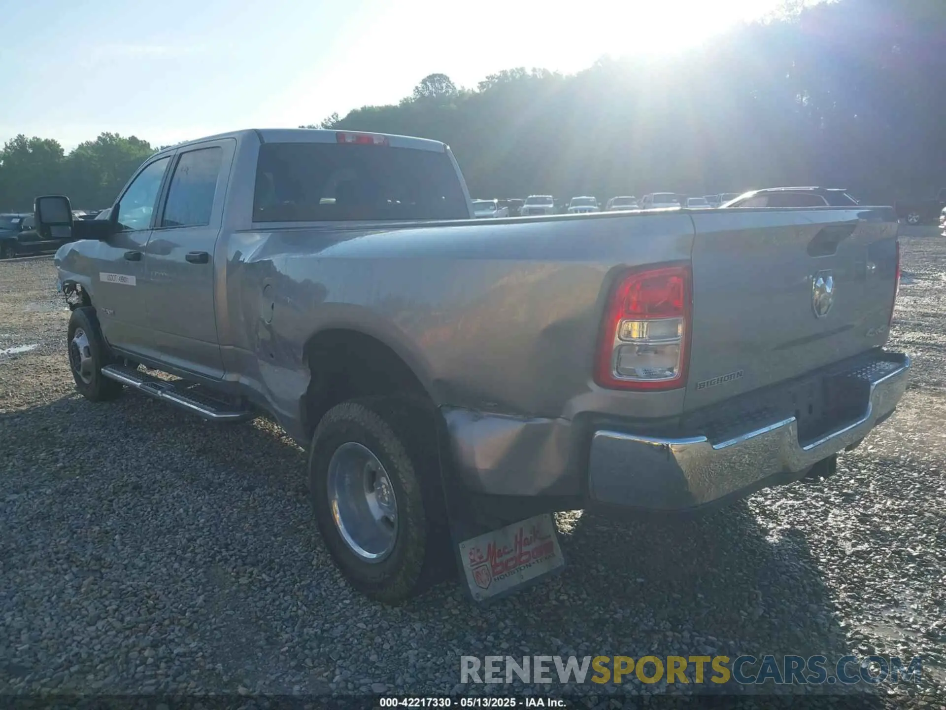 3 Photograph of a damaged car 3C63RRHL1RG337184 RAM 3500 2024