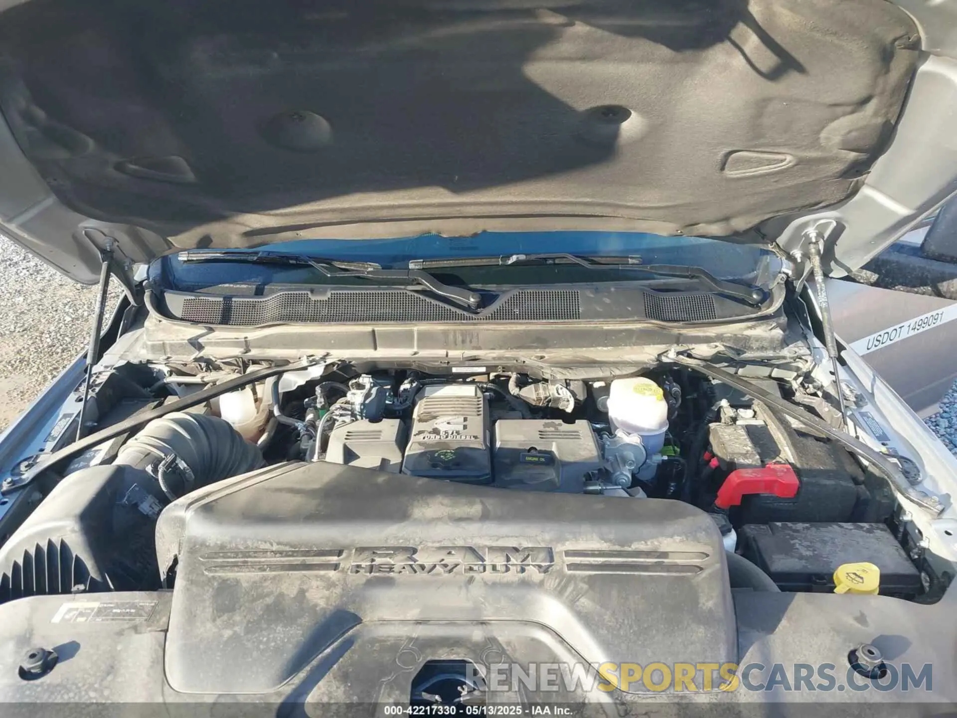 9 Photograph of a damaged car 3C63RRHL1RG337184 RAM 3500 2024
