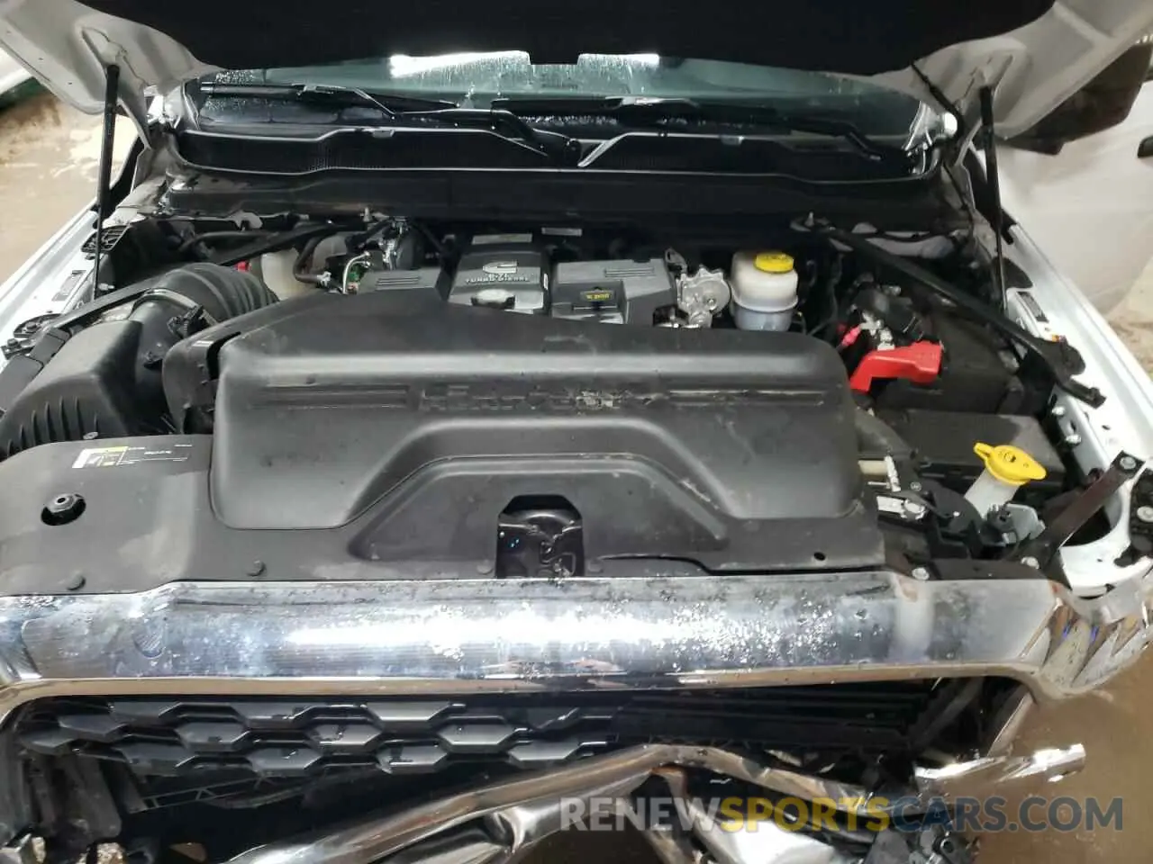 11 Photograph of a damaged car 3C63RRHL5RG341383 RAM 3500 2024