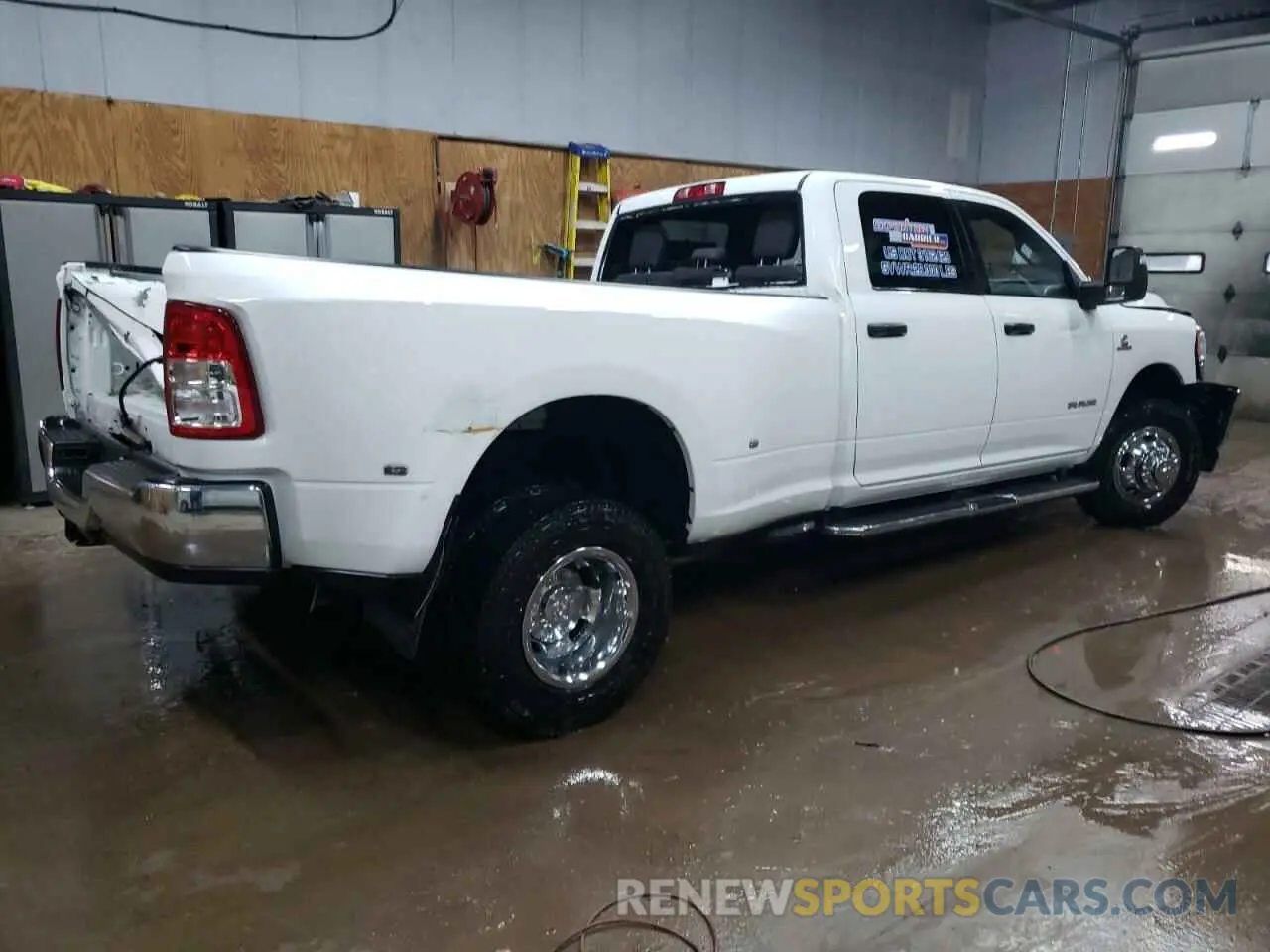 3 Photograph of a damaged car 3C63RRHL5RG341383 RAM 3500 2024