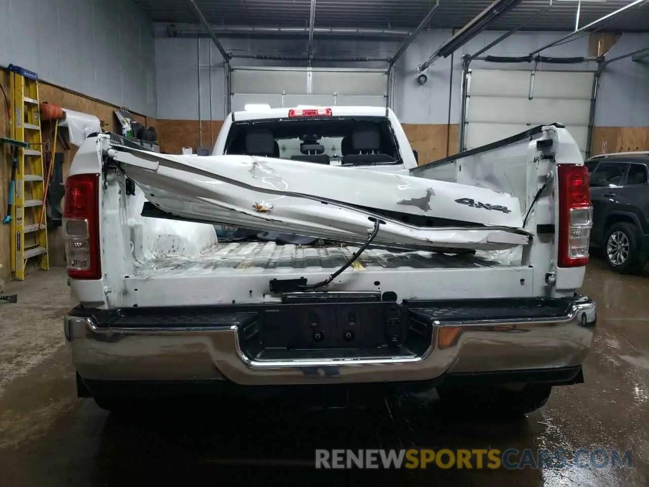6 Photograph of a damaged car 3C63RRHL5RG341383 RAM 3500 2024