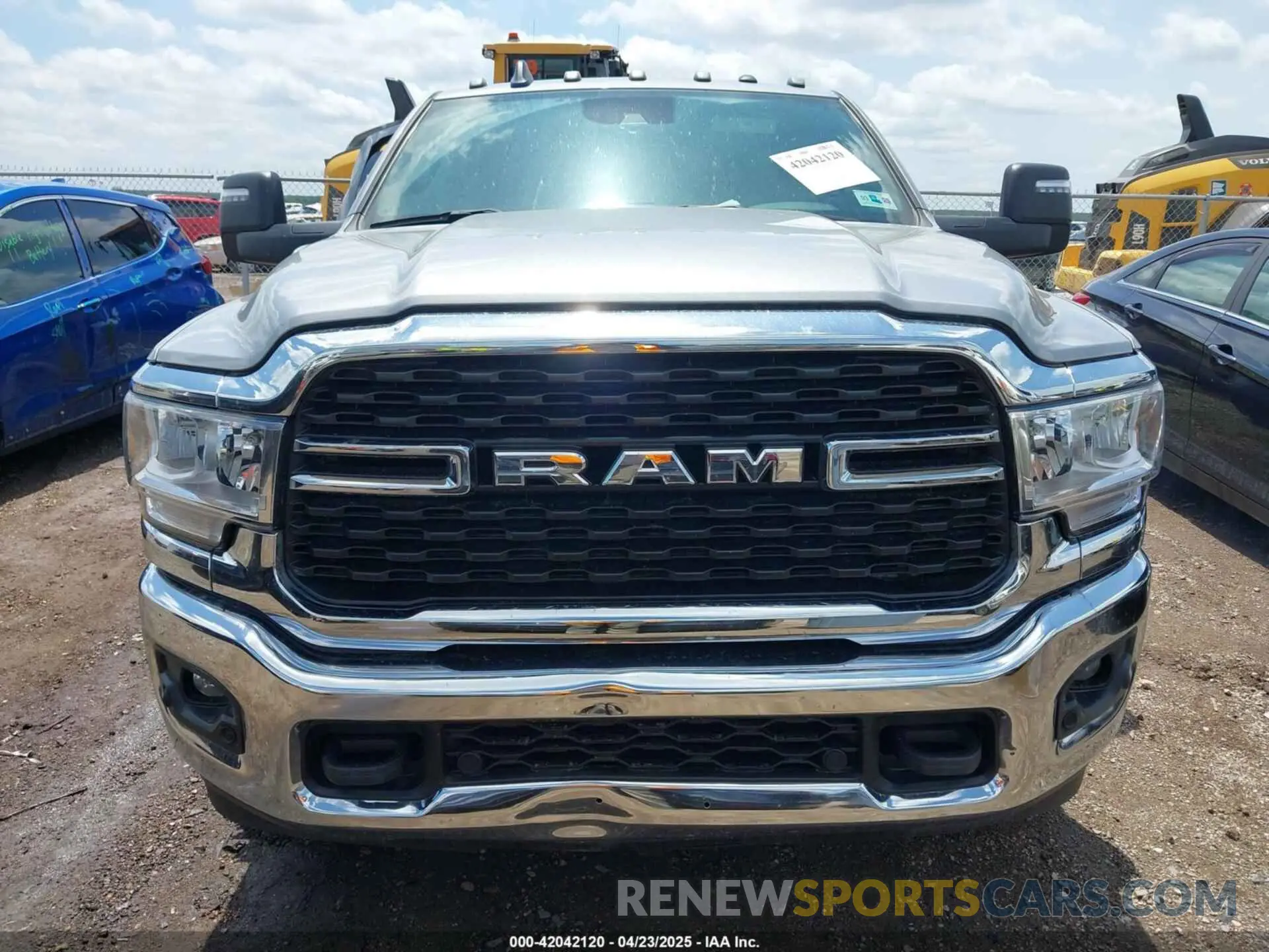 11 Photograph of a damaged car 3C63RRHL7RG214893 RAM 3500 2024