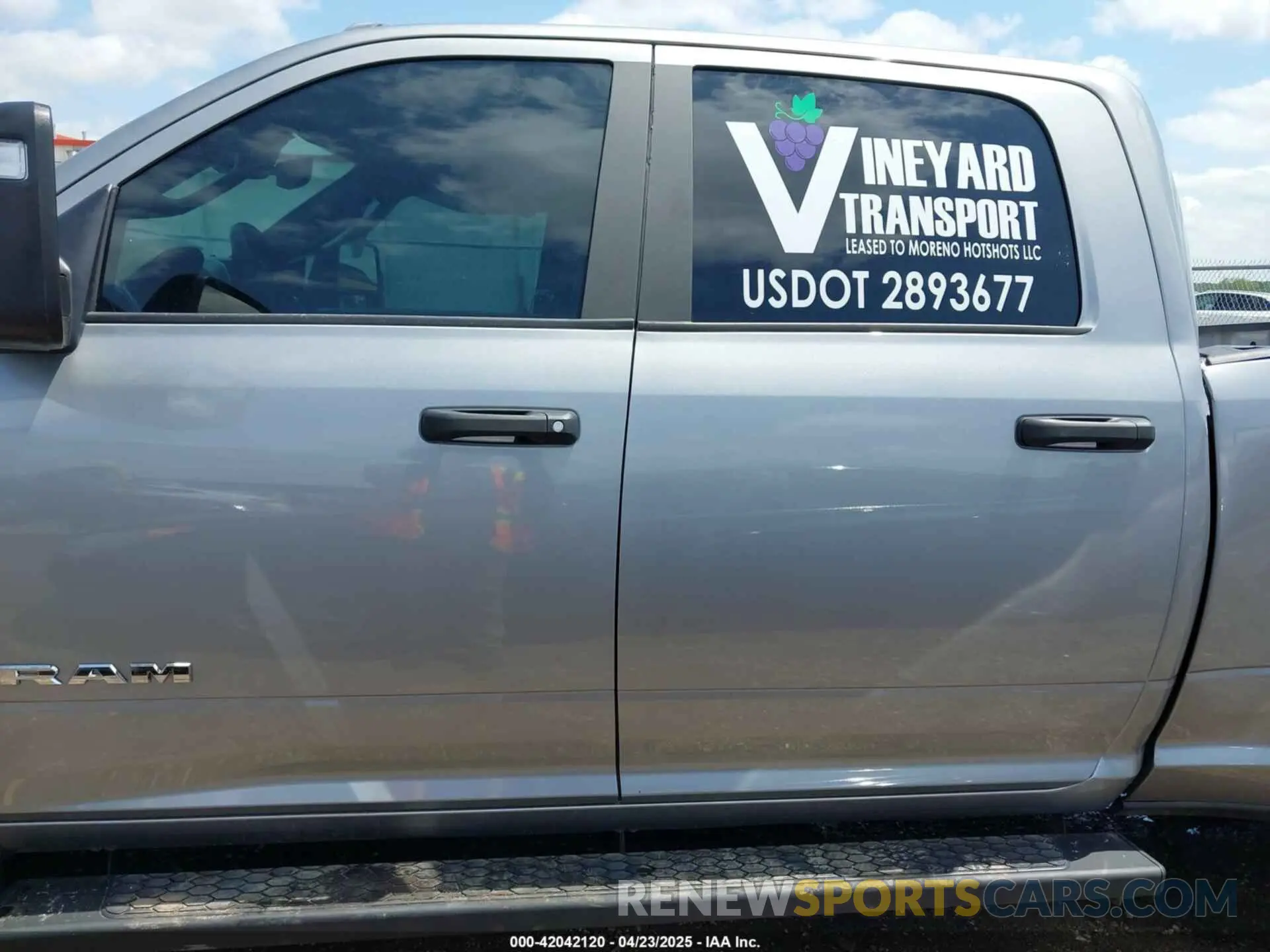 13 Photograph of a damaged car 3C63RRHL7RG214893 RAM 3500 2024