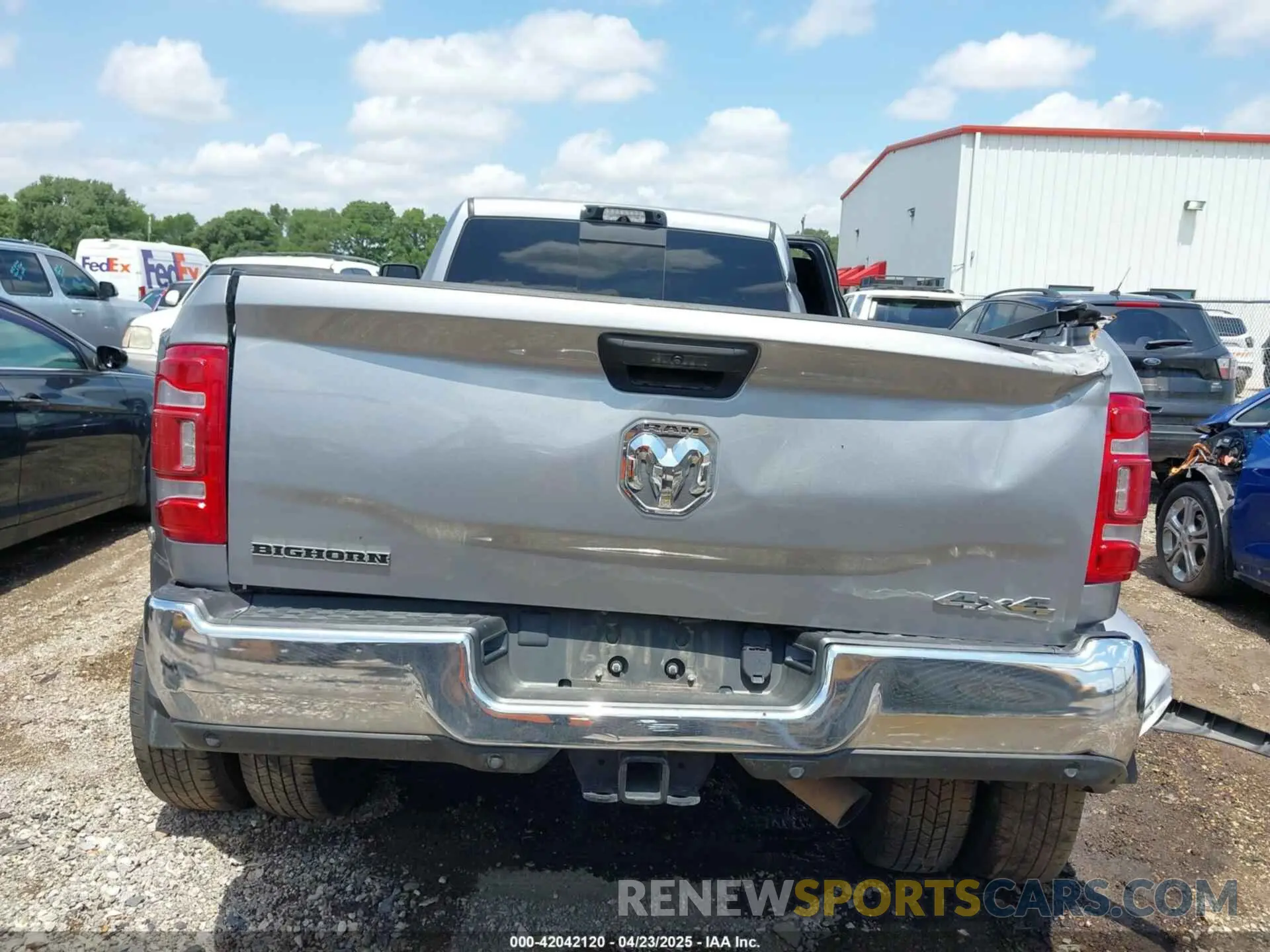 14 Photograph of a damaged car 3C63RRHL7RG214893 RAM 3500 2024