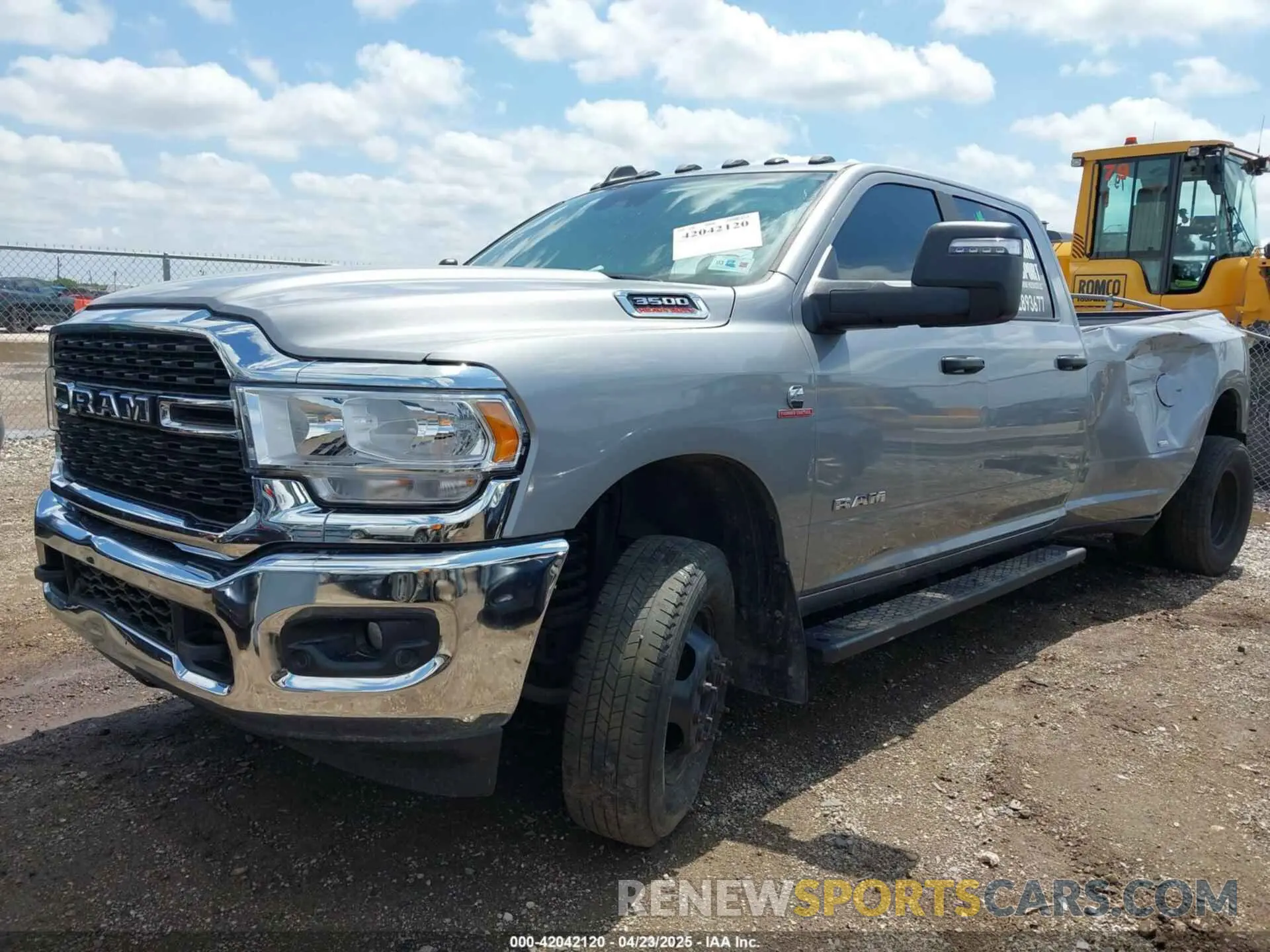 2 Photograph of a damaged car 3C63RRHL7RG214893 RAM 3500 2024