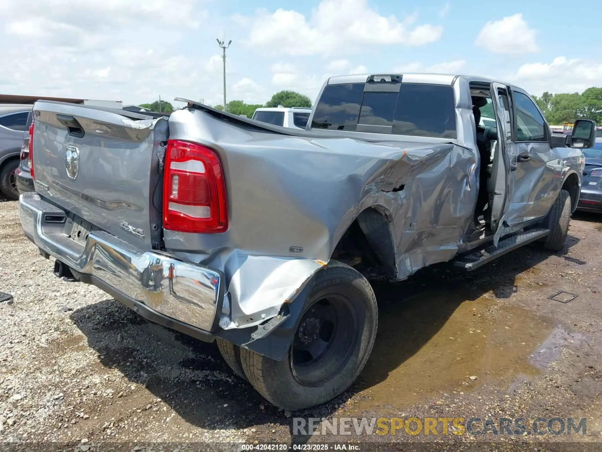 4 Photograph of a damaged car 3C63RRHL7RG214893 RAM 3500 2024
