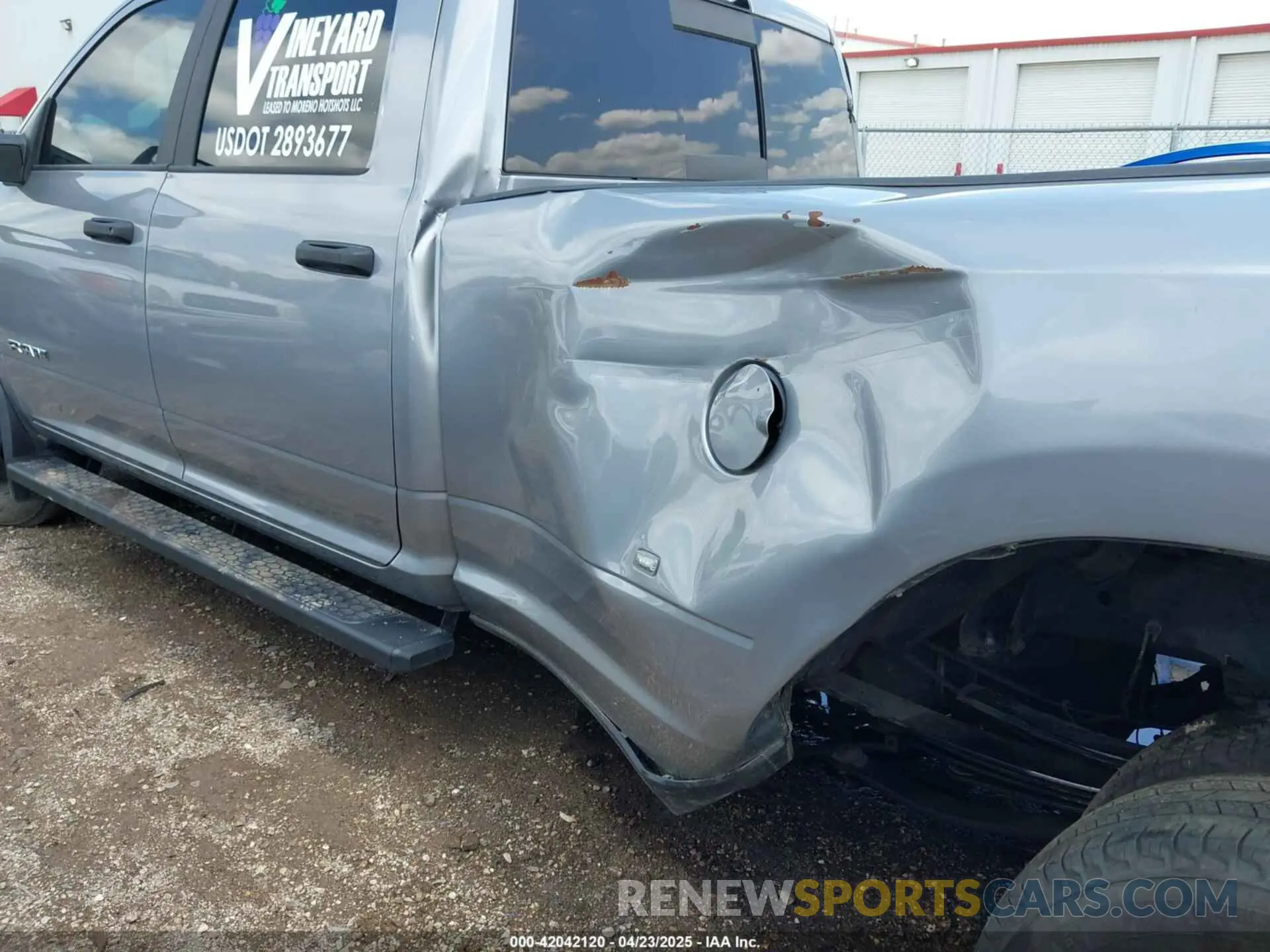 6 Photograph of a damaged car 3C63RRHL7RG214893 RAM 3500 2024