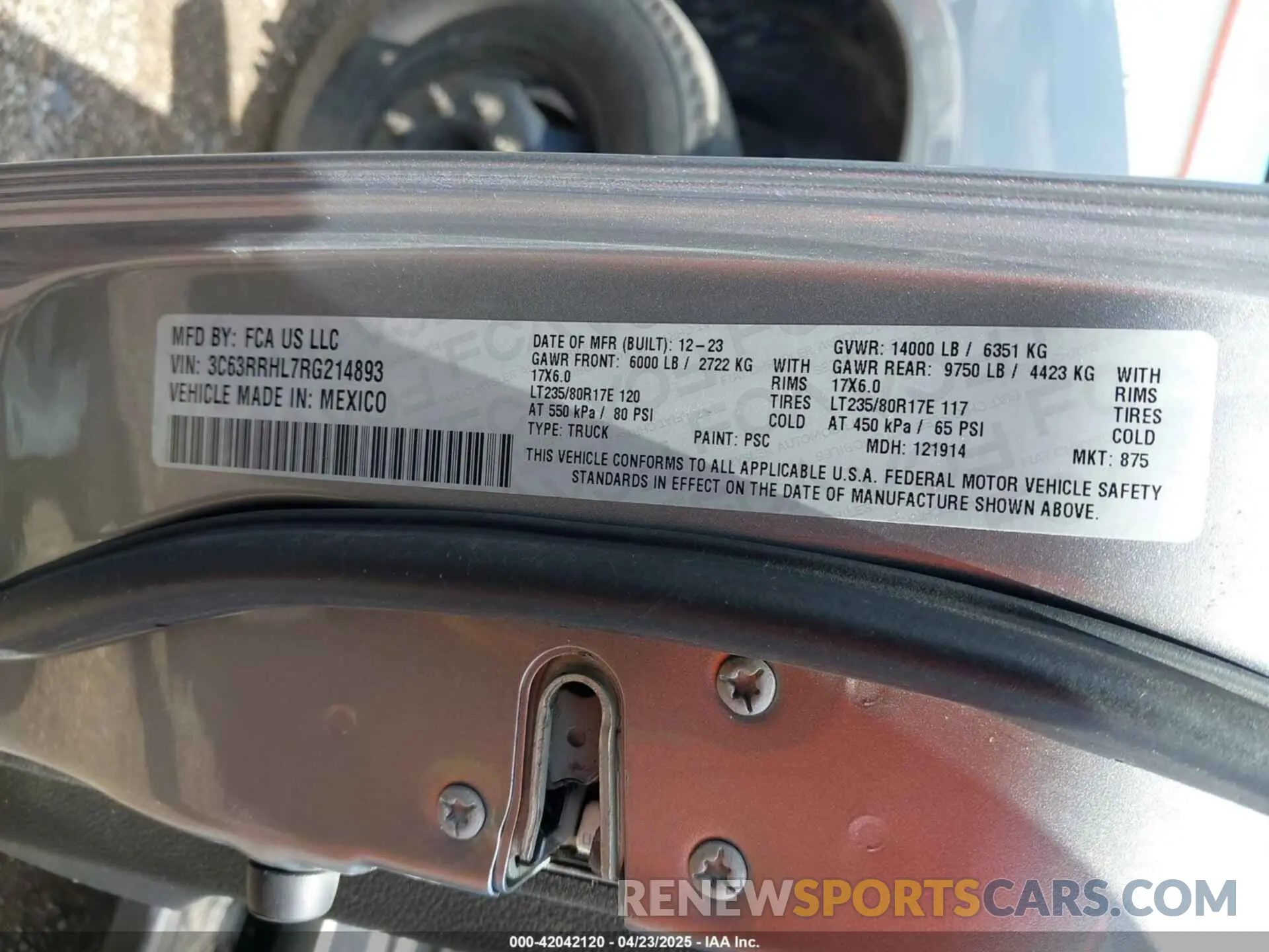 9 Photograph of a damaged car 3C63RRHL7RG214893 RAM 3500 2024