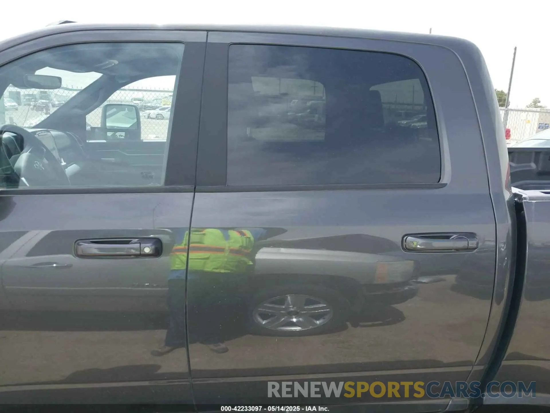14 Photograph of a damaged car 3C63RRHL8RG257932 RAM 3500 2024