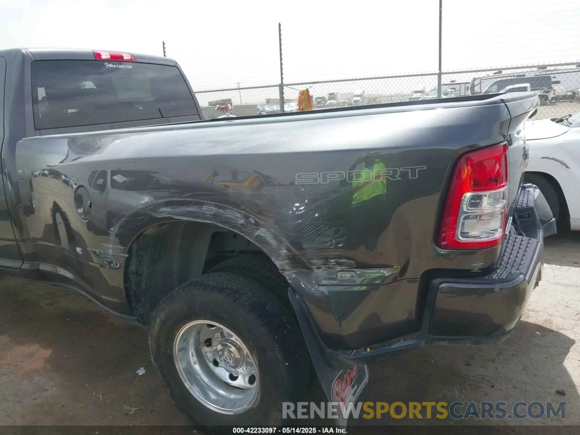 16 Photograph of a damaged car 3C63RRHL8RG257932 RAM 3500 2024