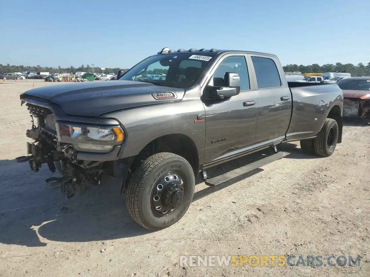 1 Photograph of a damaged car 3C63RRHL9RG257177 RAM 3500 2024