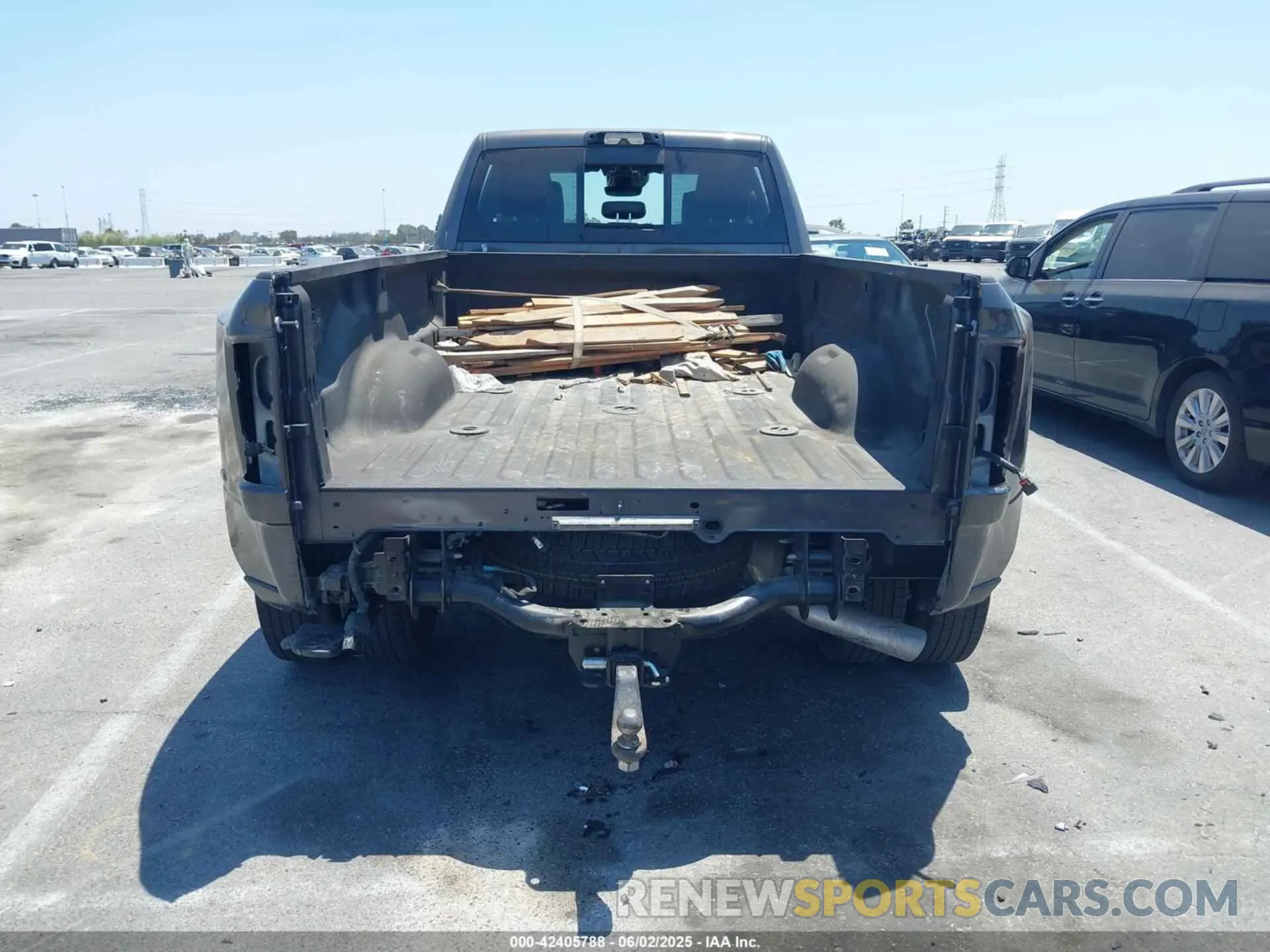 14 Photograph of a damaged car 3C63RRJL0RG221968 RAM 3500 2024