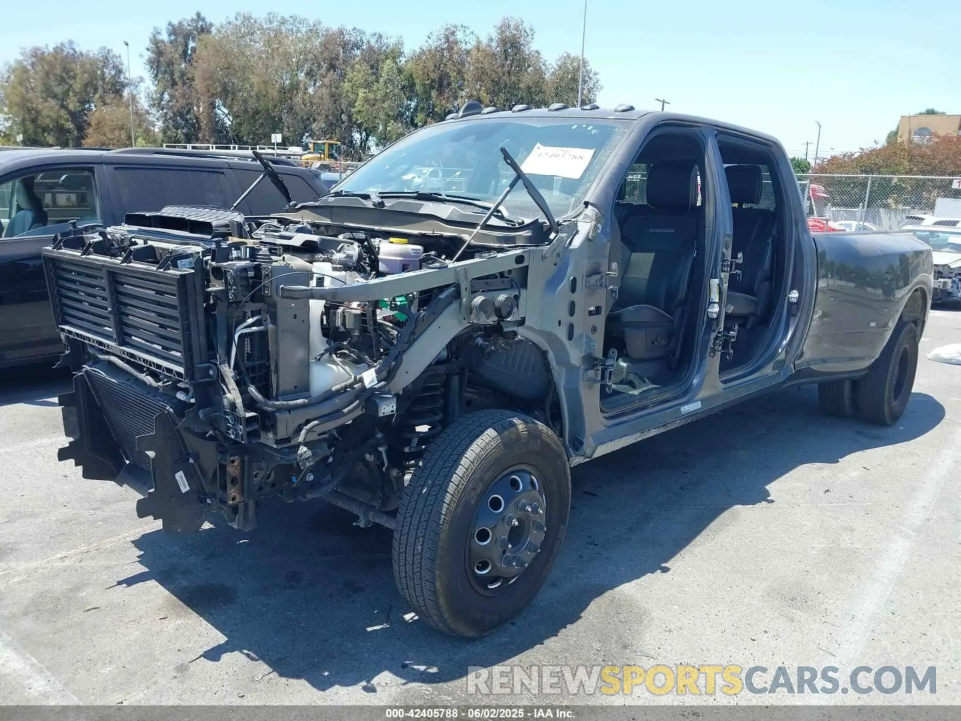 2 Photograph of a damaged car 3C63RRJL0RG221968 RAM 3500 2024