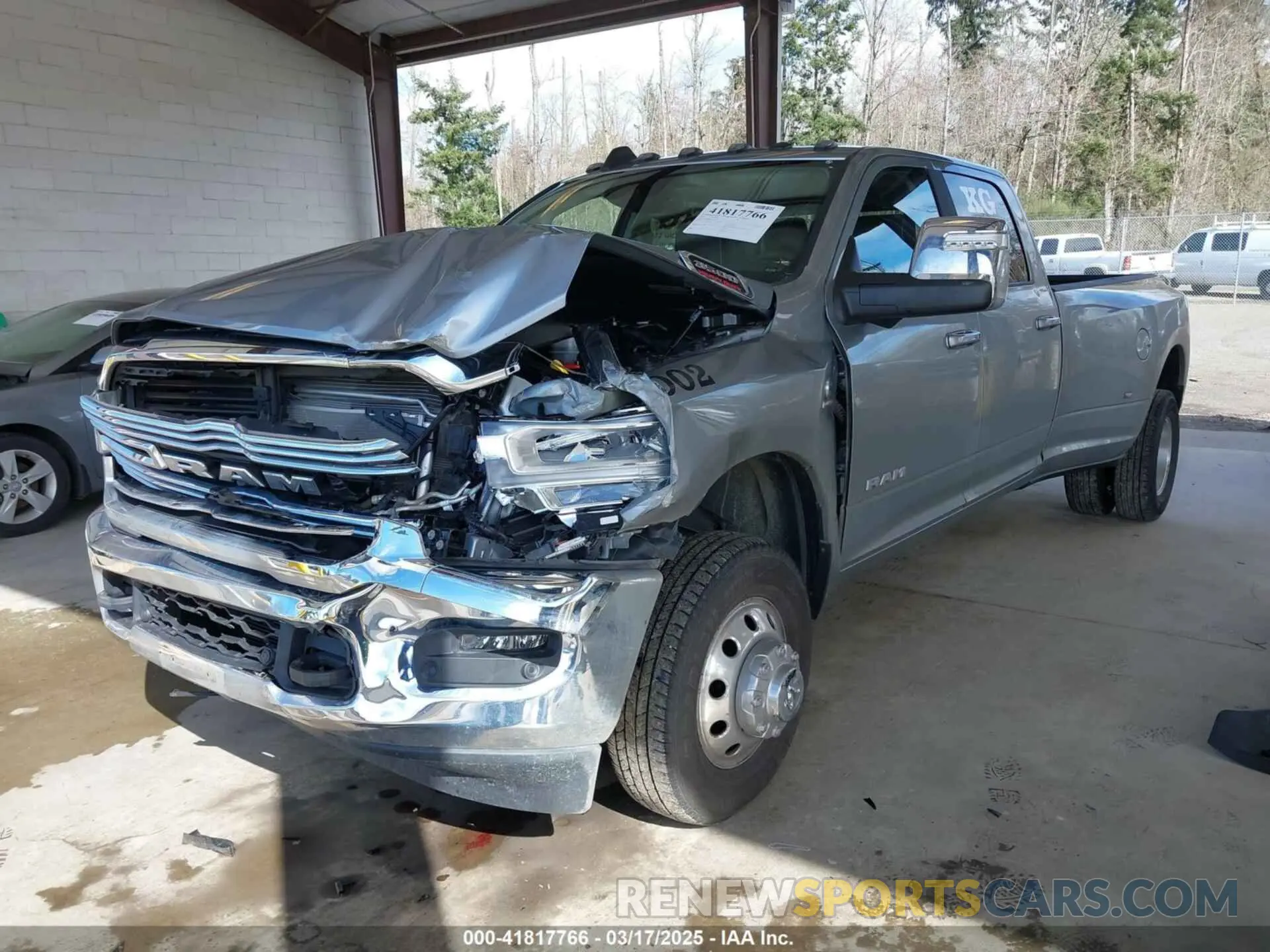2 Photograph of a damaged car 3C63RRJL2RG120933 RAM 3500 2024