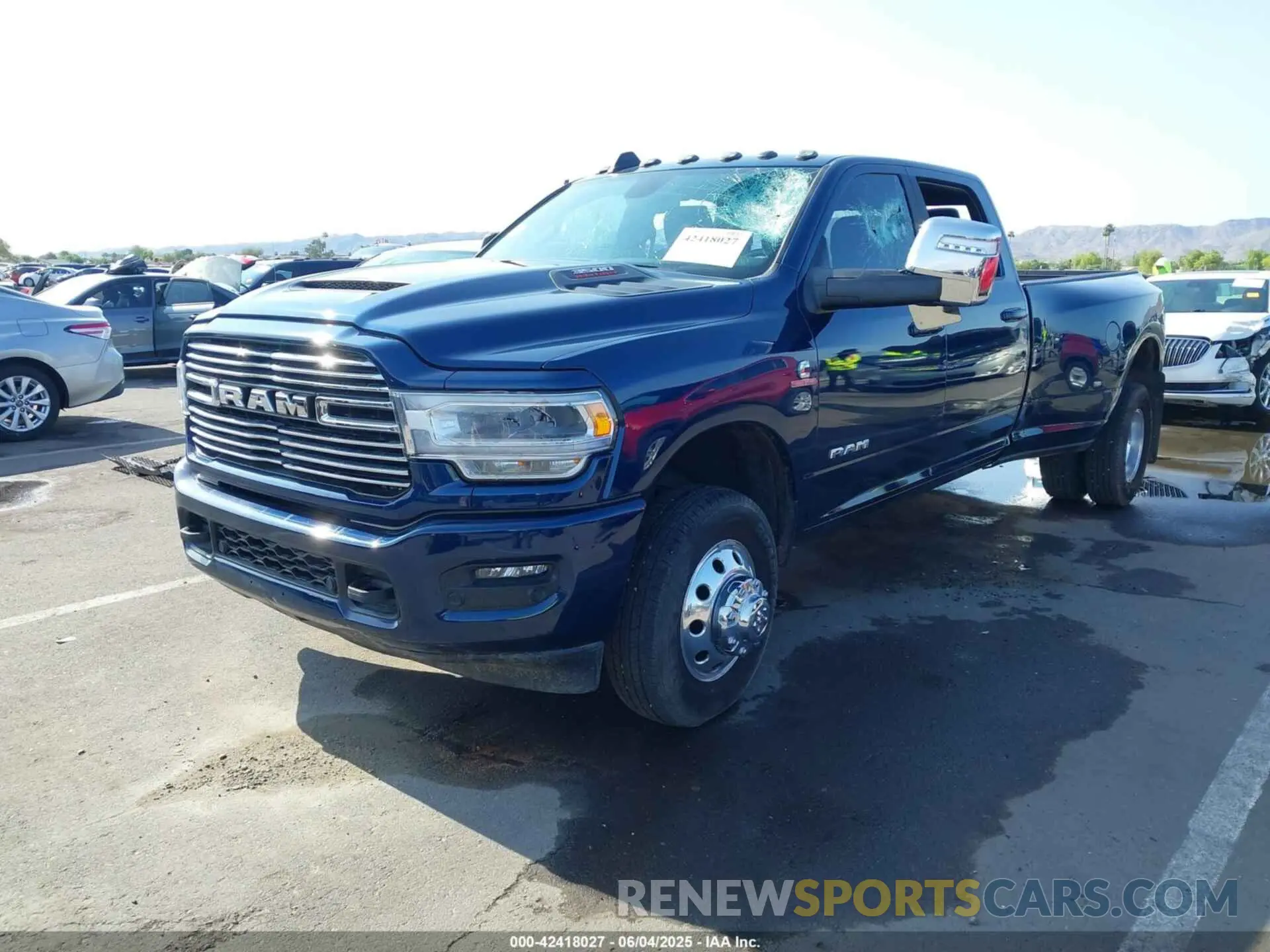 2 Photograph of a damaged car 3C63RRJL3RG317545 RAM 3500 2024