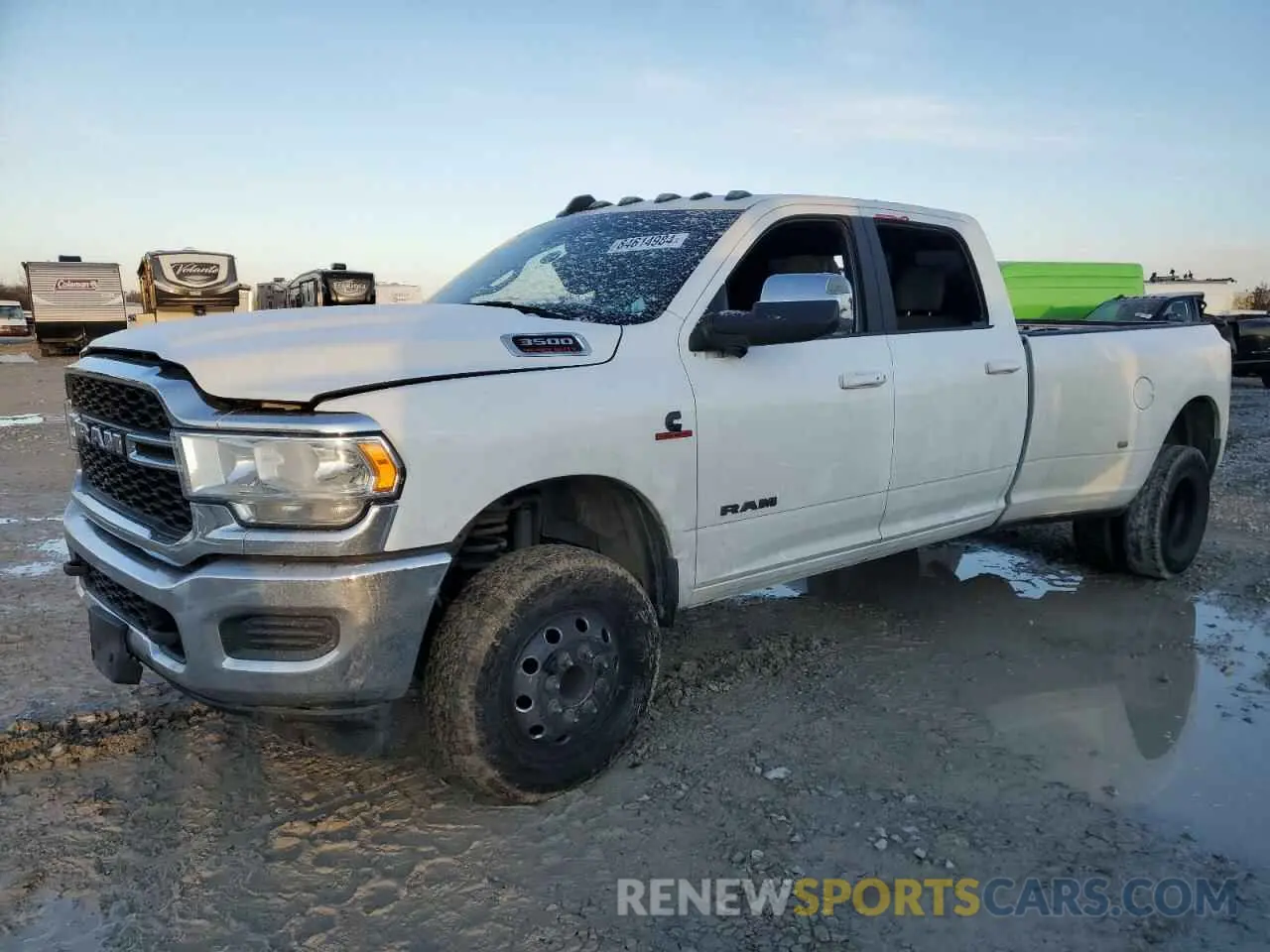 1 Photograph of a damaged car 3C63RRJL5RG109005 RAM 3500 2024