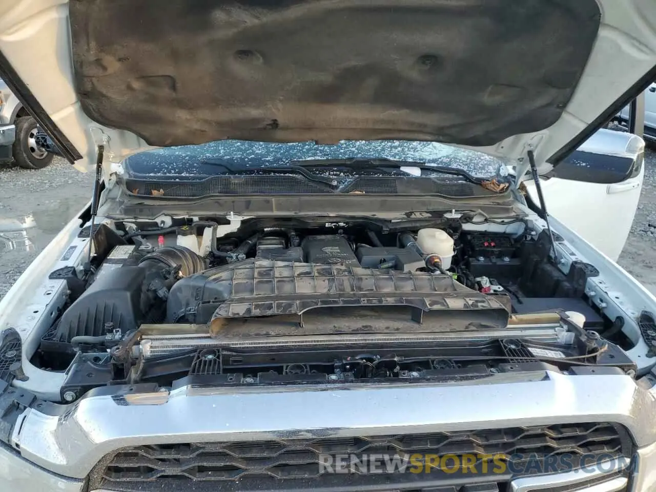11 Photograph of a damaged car 3C63RRJL5RG109005 RAM 3500 2024