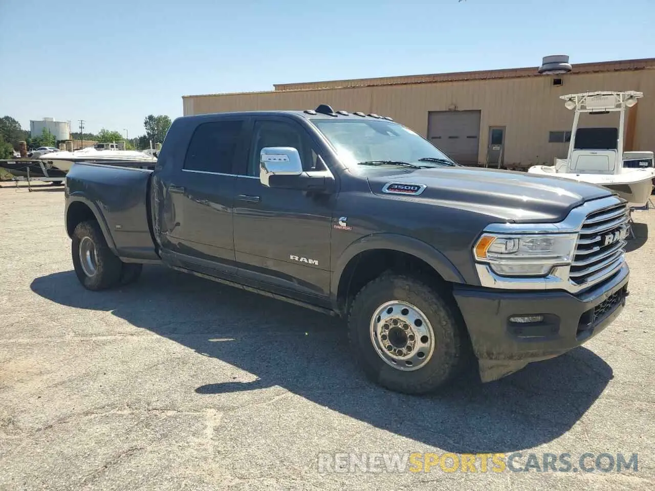 4 Photograph of a damaged car 3C63RRNLXRG208896 RAM 3500 2024