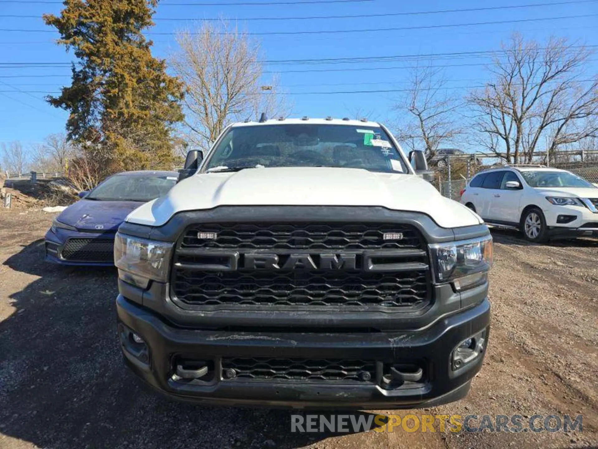 4 Photograph of a damaged car 3C7WR9CL0RG274353 RAM 3500 2024