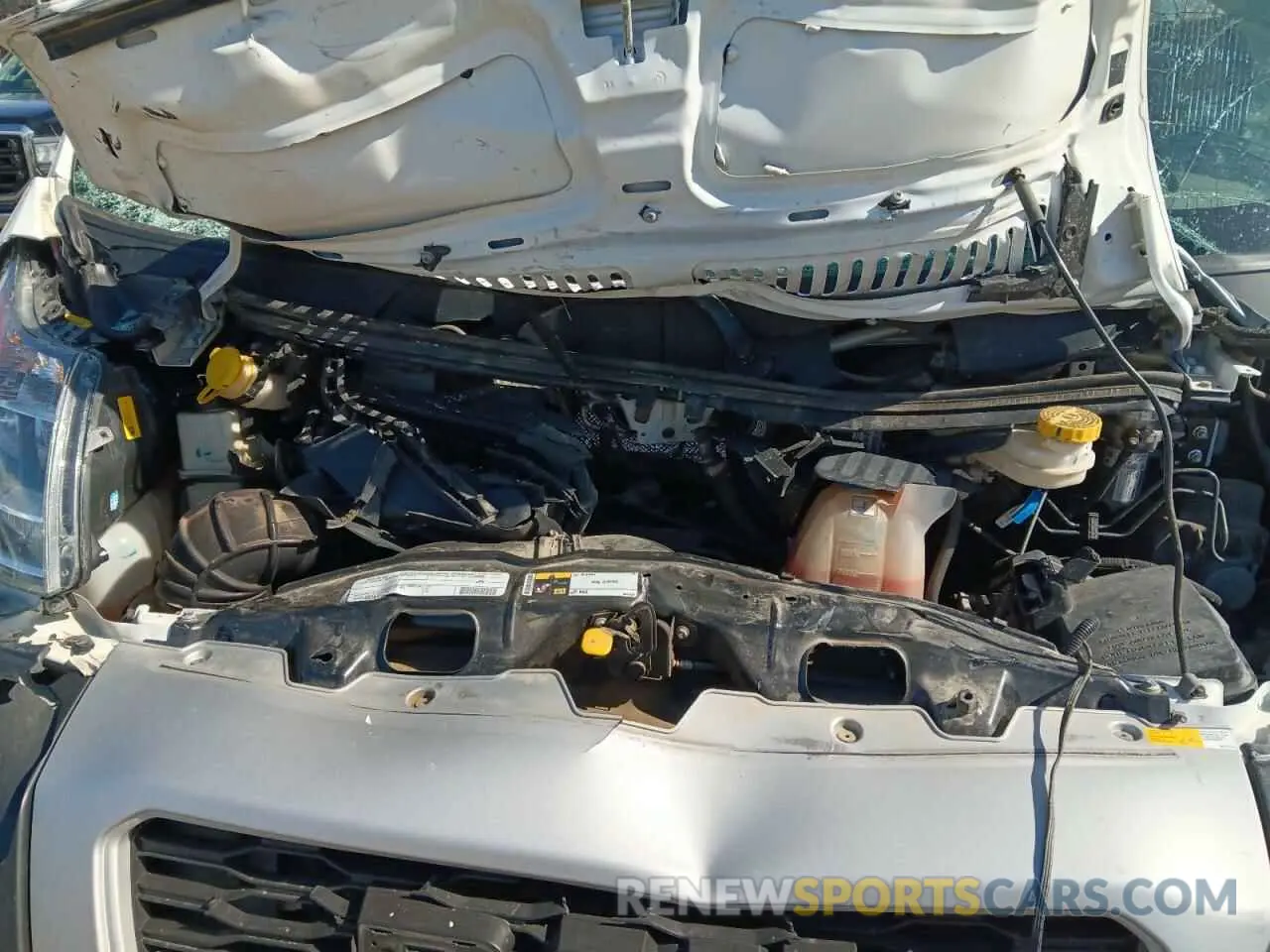 12 Photograph of a damaged car 3C6TRVAG4KE528914 RAM All Models 2019