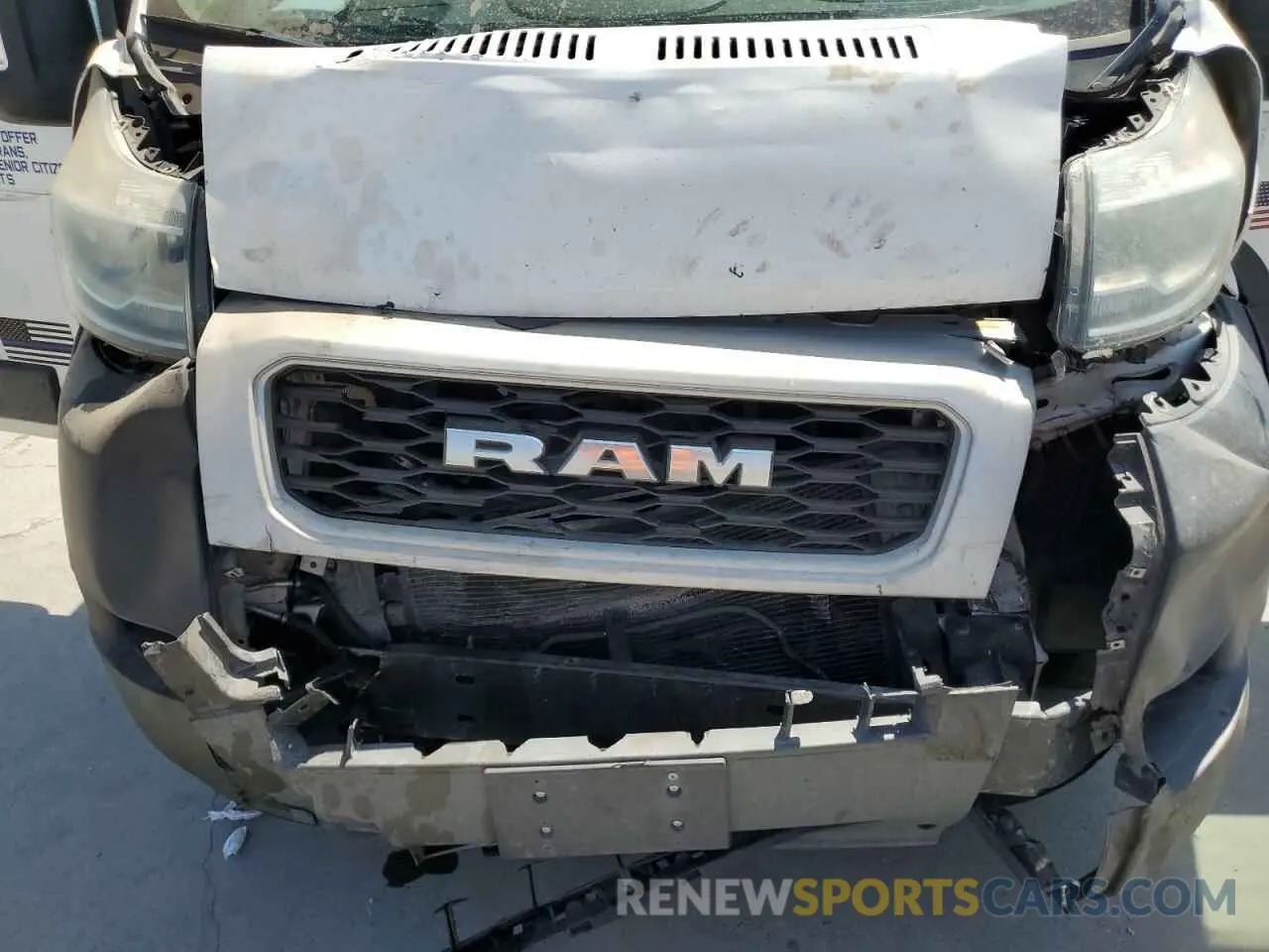 12 Photograph of a damaged car 3C6TRVAGXKE502723 RAM All Models 2019