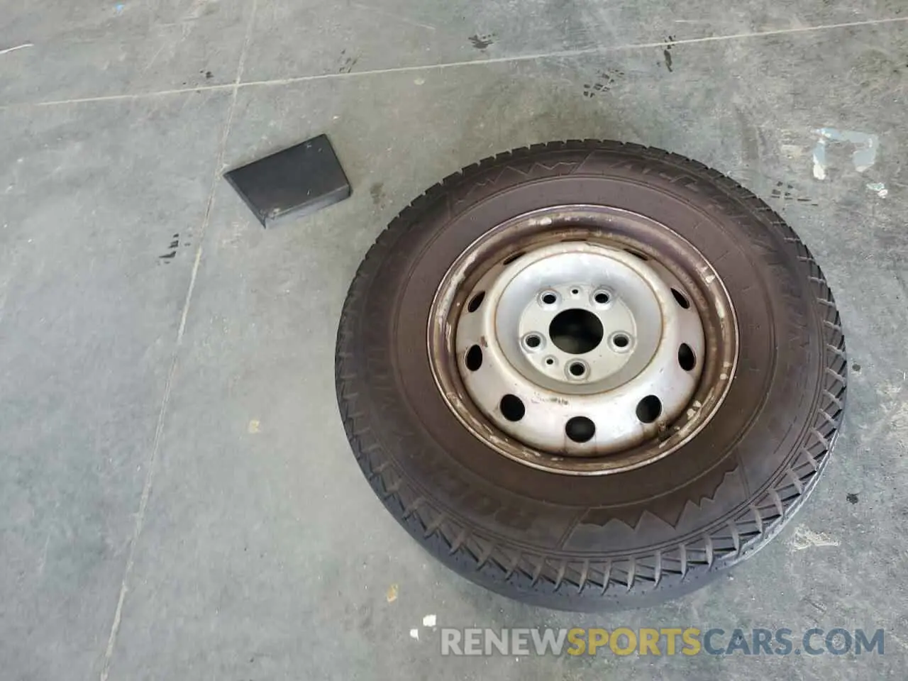 13 Photograph of a damaged car 3C6TRVBG1KE547404 RAM All Models 2019