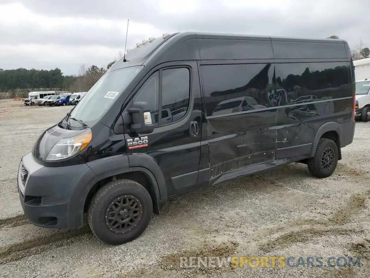 1 Photograph of a damaged car 3C6TRVDG5KE508439 RAM All Models 2019