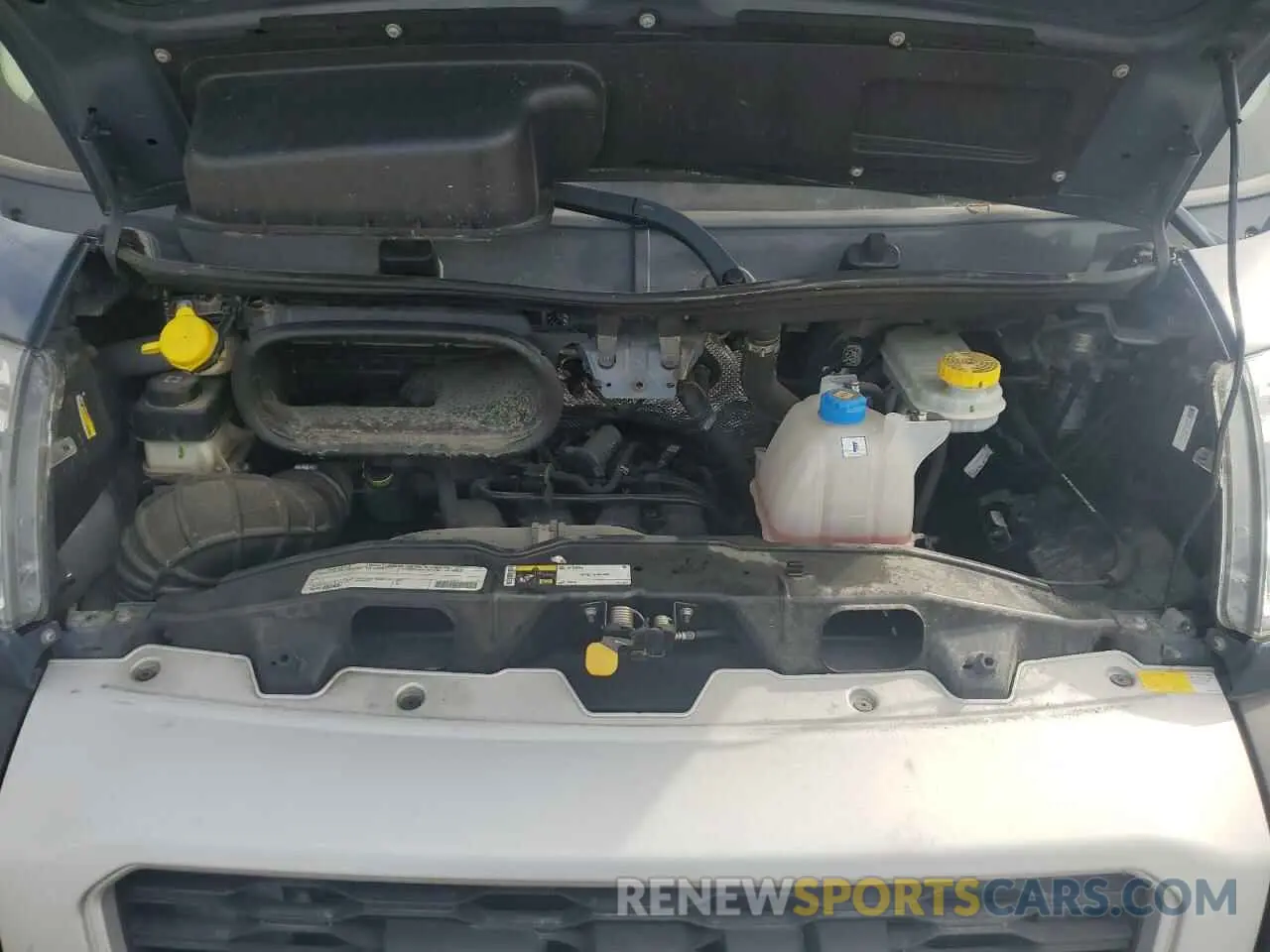 12 Photograph of a damaged car 3C6TRVDG5KE513933 RAM All Models 2019