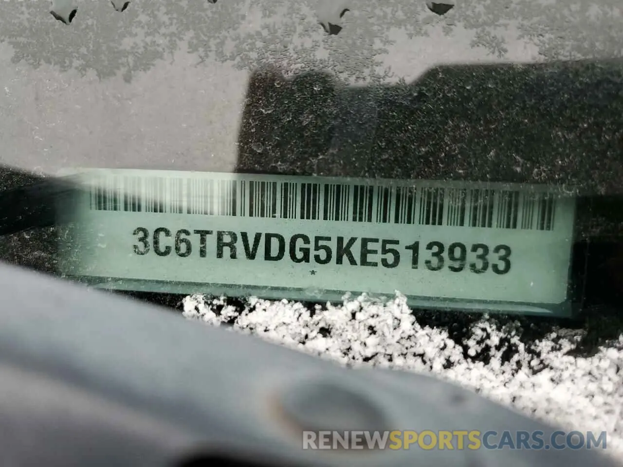 13 Photograph of a damaged car 3C6TRVDG5KE513933 RAM All Models 2019