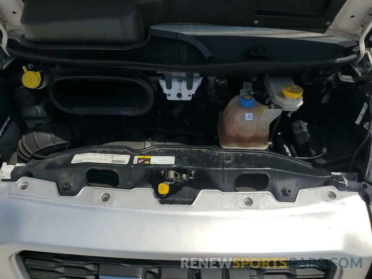 12 Photograph of a damaged car 3C6TRVDG5KE557396 RAM All Models 2019
