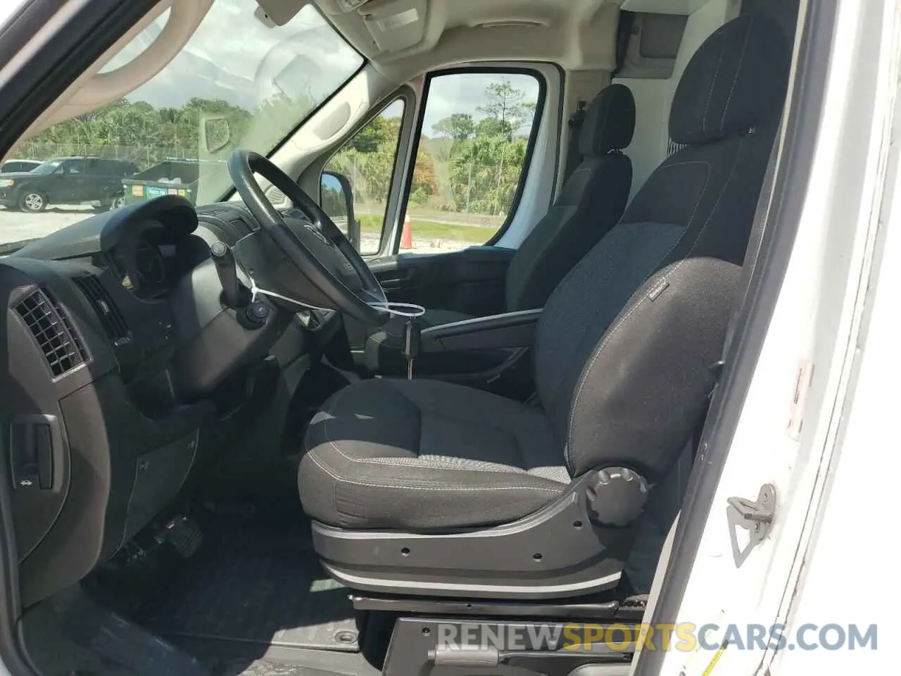 7 Photograph of a damaged car 3C6TRVDG5KE557396 RAM All Models 2019