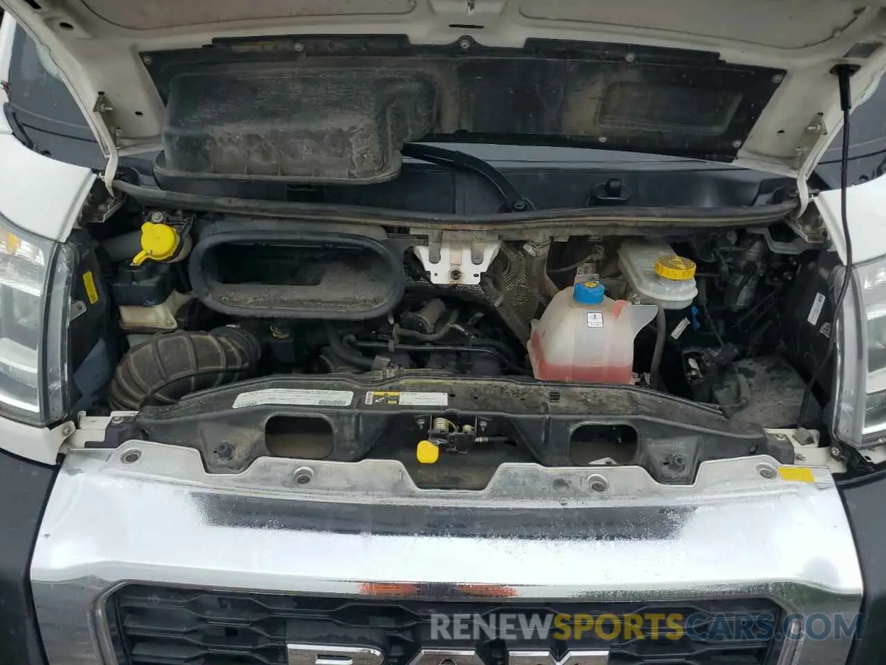 12 Photograph of a damaged car 3C6TRVDG8KE550961 RAM All Models 2019