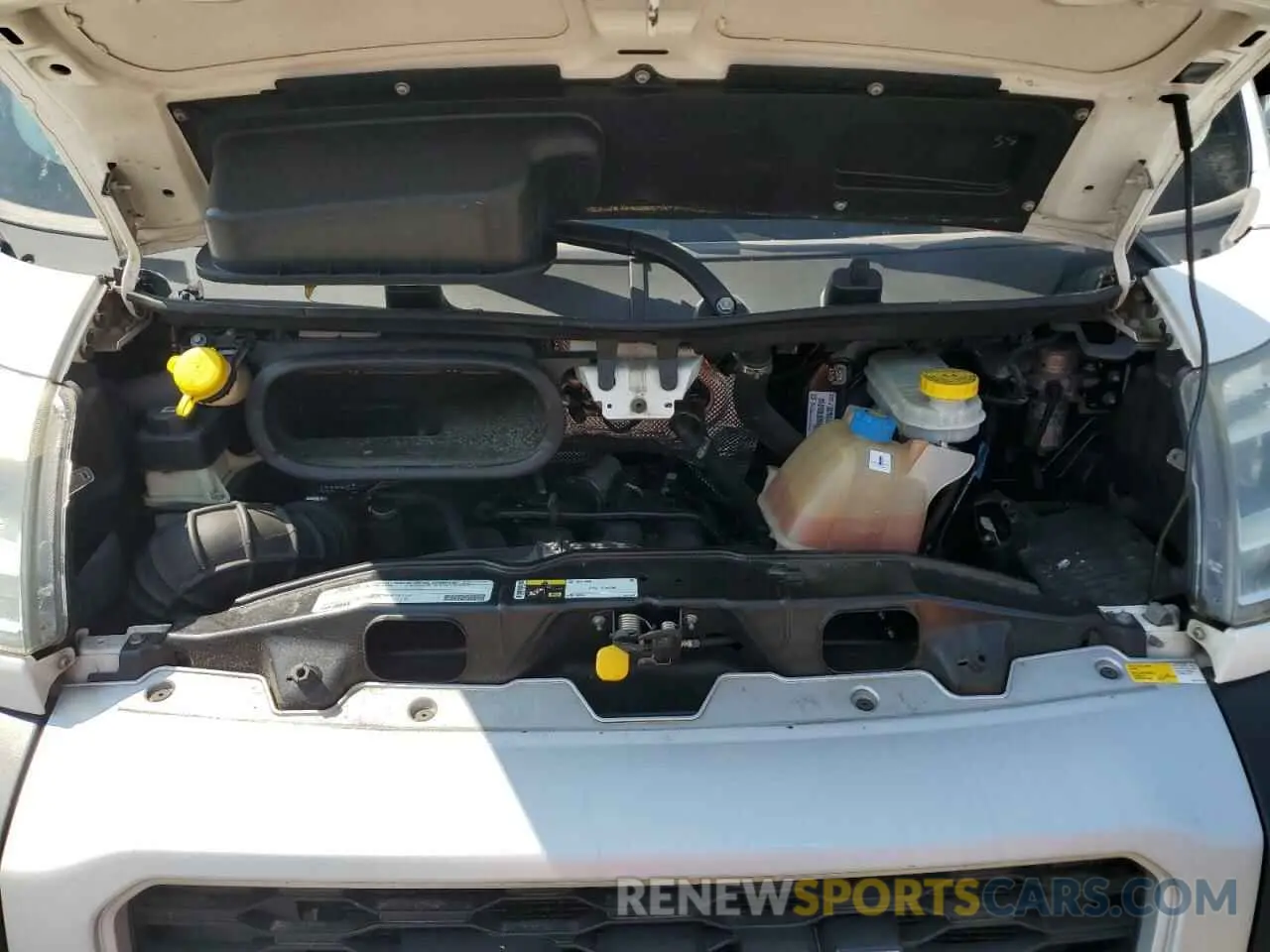 12 Photograph of a damaged car 3C6TRVNG3KE504677 RAM All Models 2019