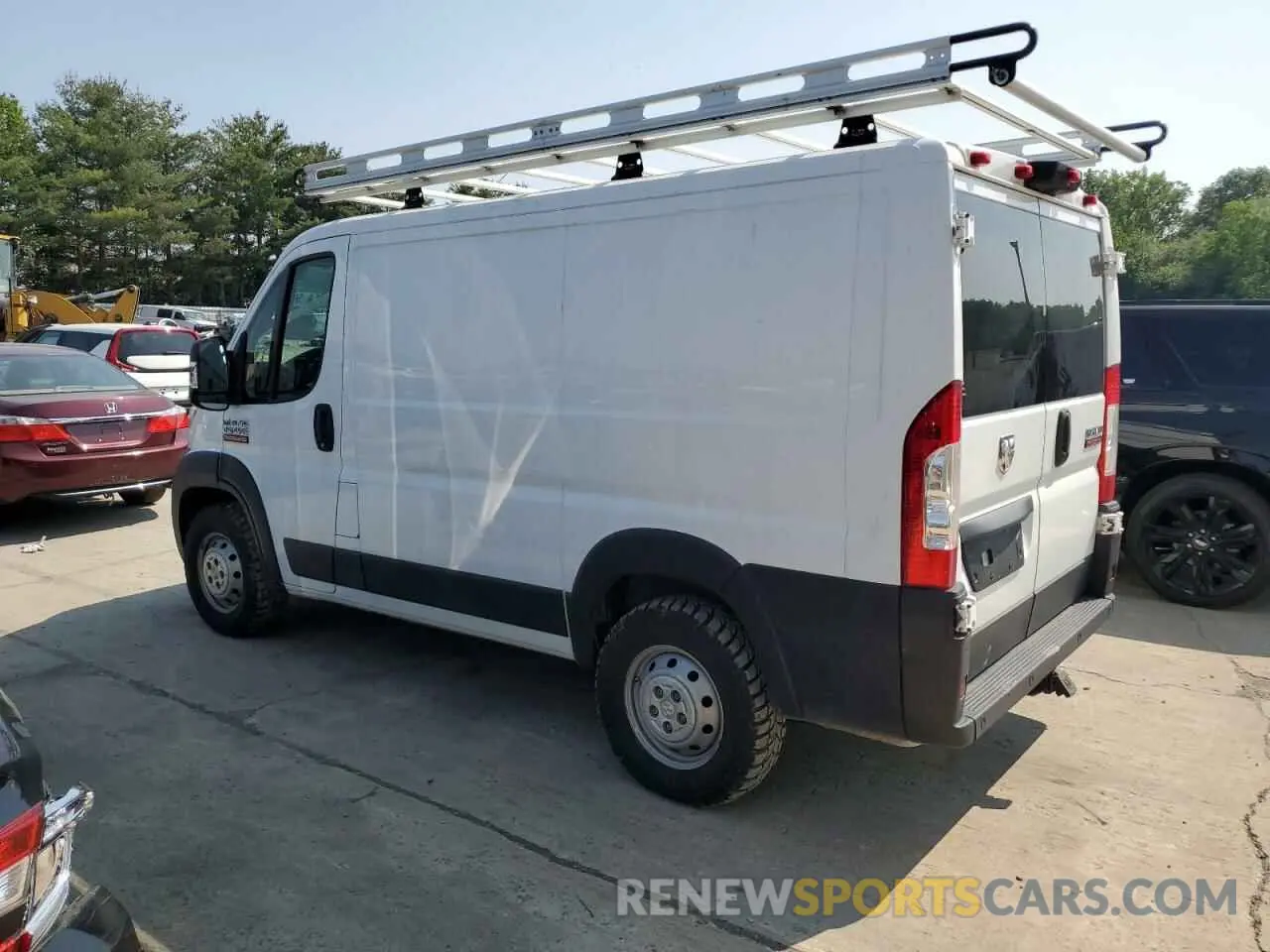 2 Photograph of a damaged car 3C6TRVNG3KE504677 RAM All Models 2019