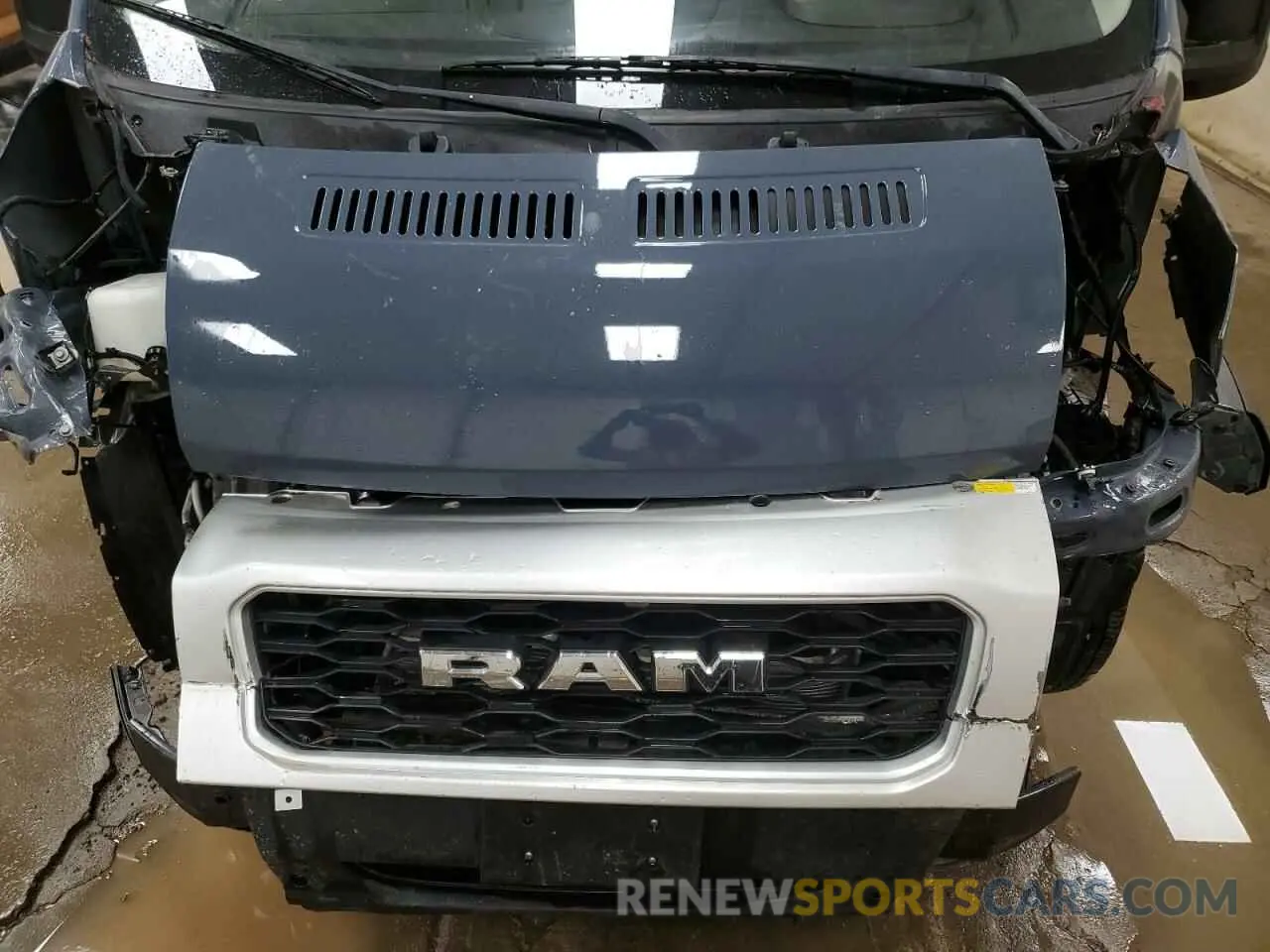 12 Photograph of a damaged car 3C6URVJG3KE564100 RAM All Models 2019
