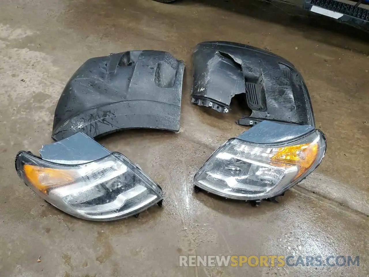 13 Photograph of a damaged car 3C6URVJG3KE564100 RAM All Models 2019