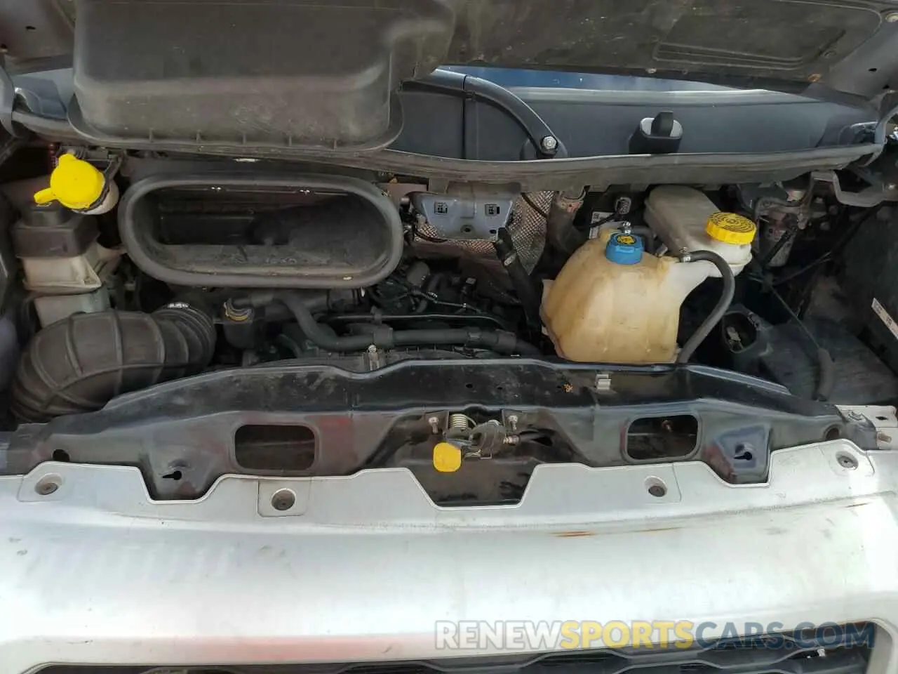 12 Photograph of a damaged car 3C6URVJG8KE555618 RAM All Models 2019