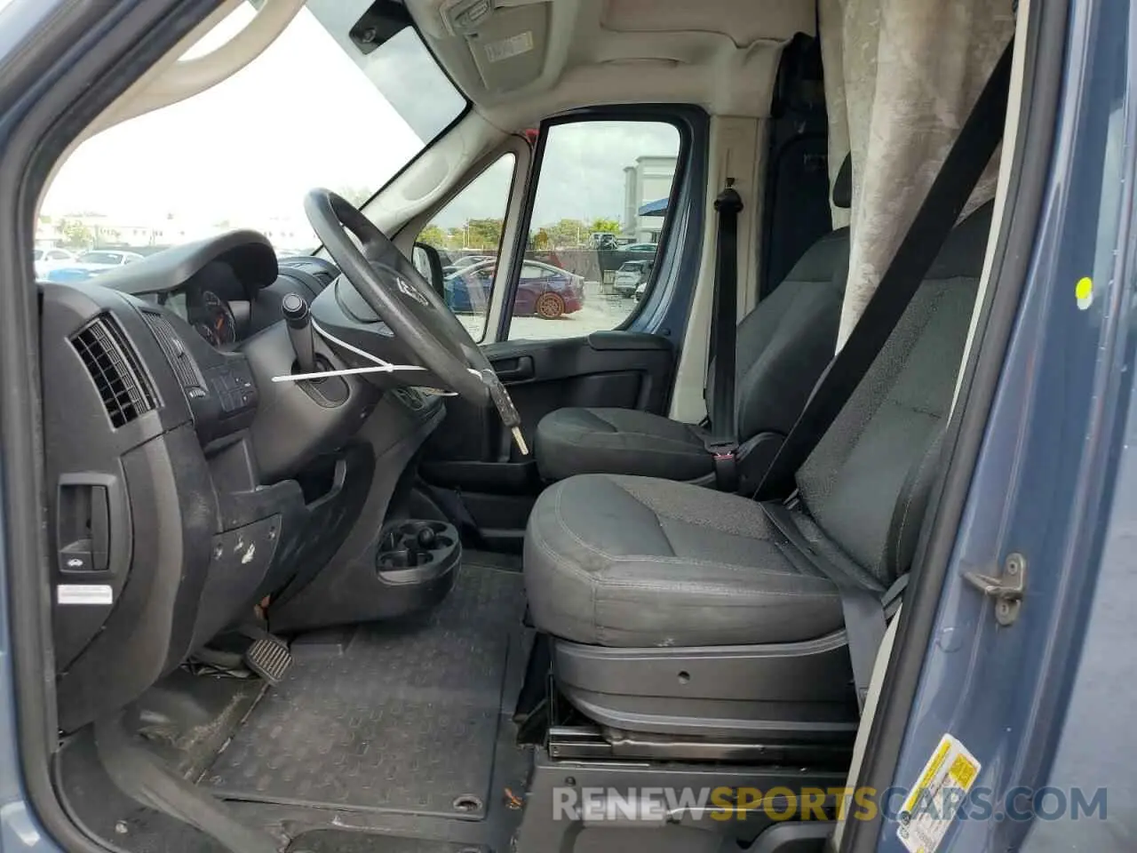 7 Photograph of a damaged car 3C6URVJG8KE555618 RAM All Models 2019