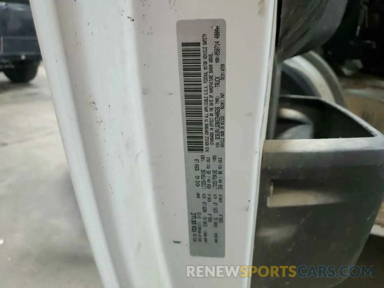 14 Photograph of a damaged car 3C6URVJG9KE540626 RAM All Models 2019