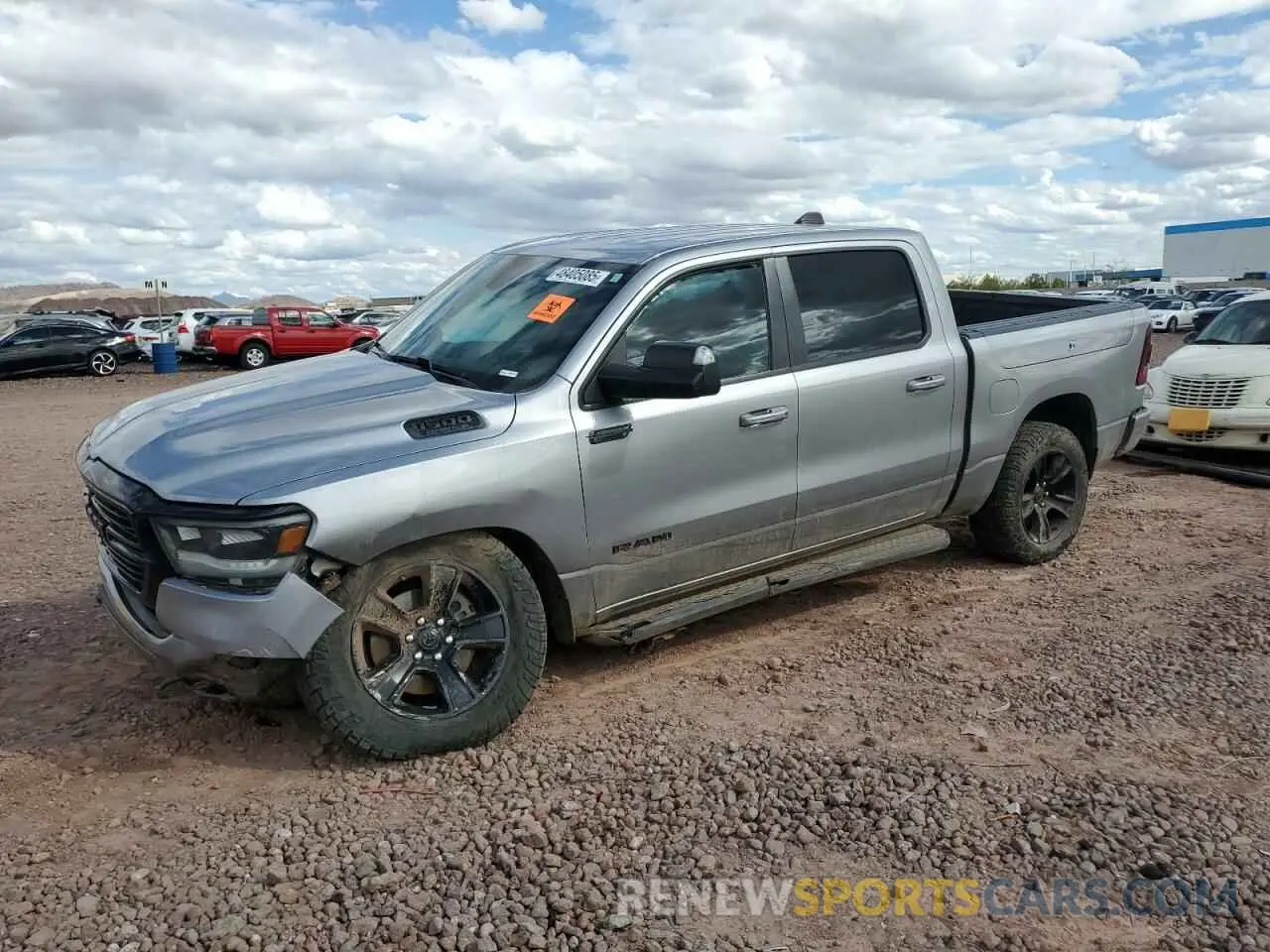 1 Photograph of a damaged car 1C6SRFFT2MN512202 RAM All Models 2021