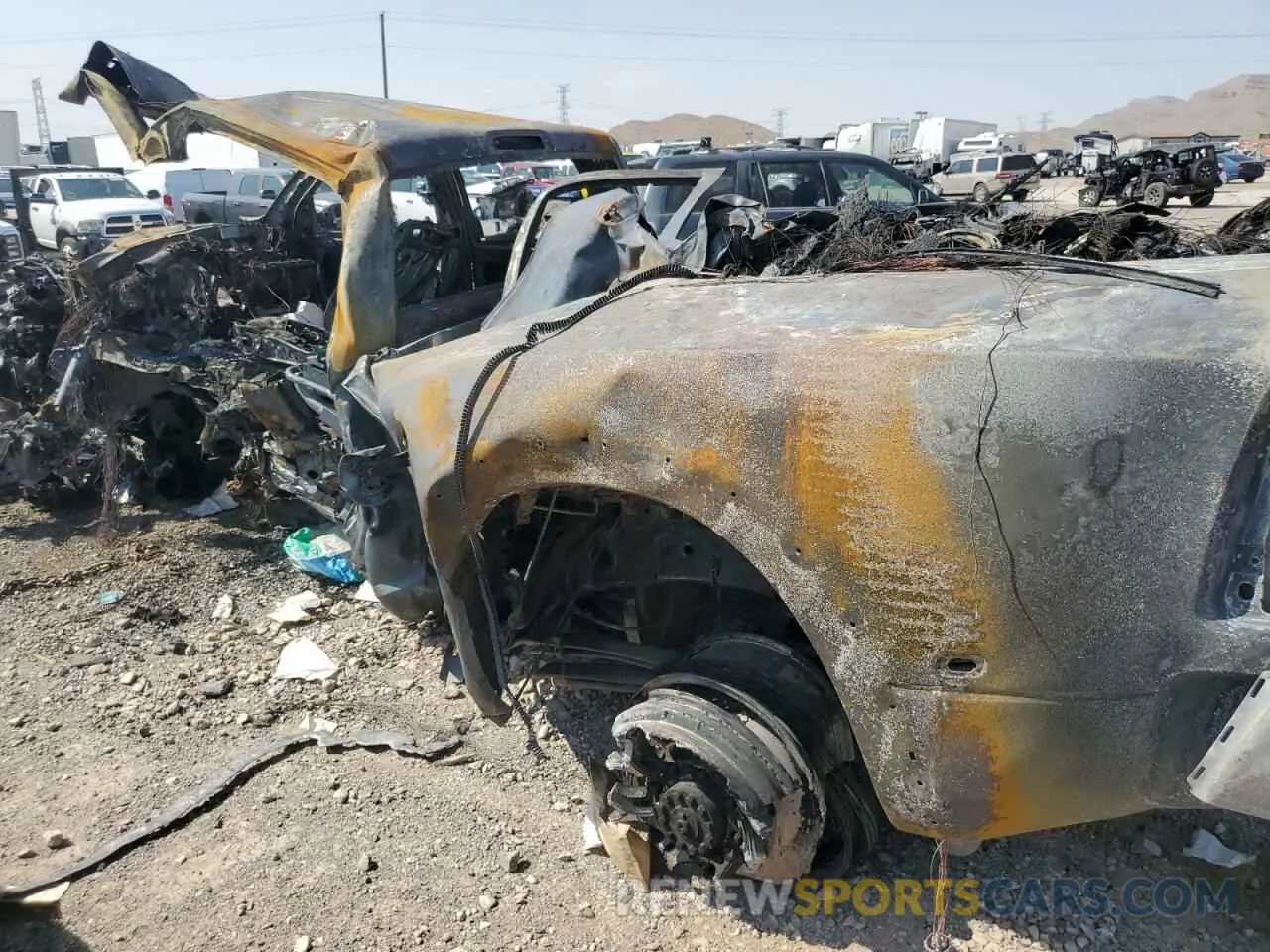 2 Photograph of a damaged car 3C63RRRL4MG688064 RAM All Models 2021