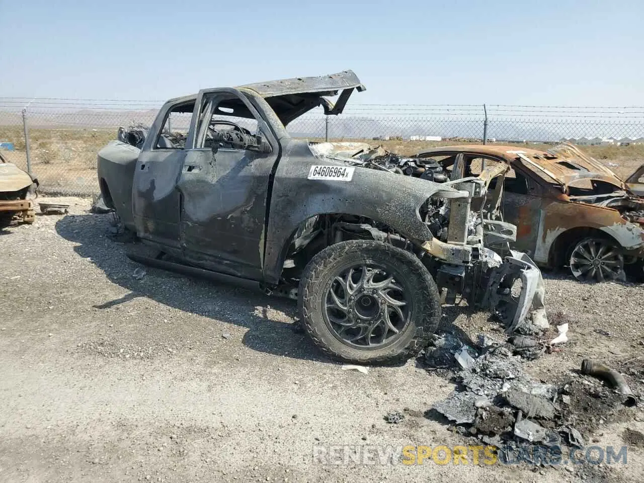 4 Photograph of a damaged car 3C63RRRL4MG688064 RAM All Models 2021