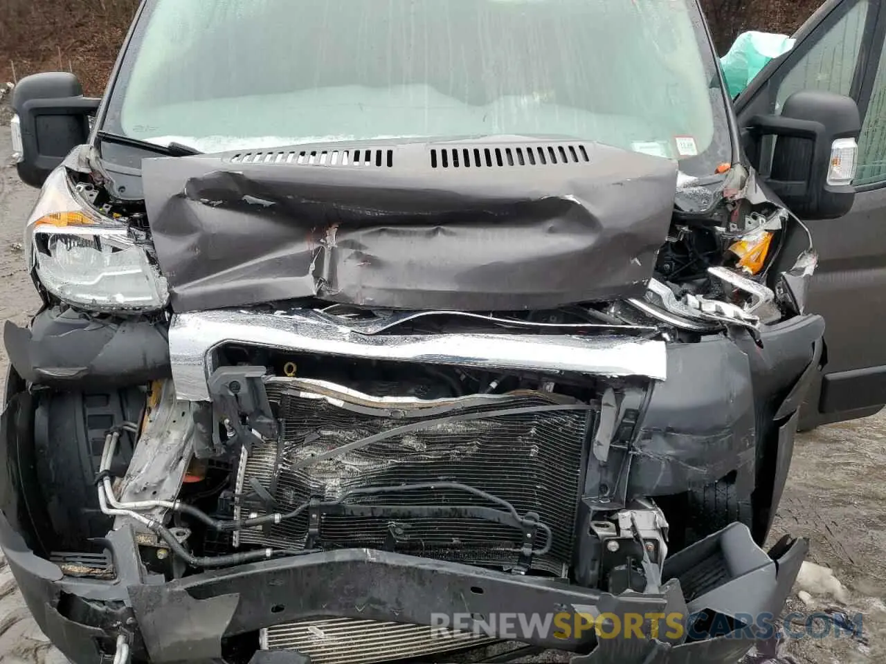 13 Photograph of a damaged car 3C6LRVDG5ME555795 RAM All Models 2021