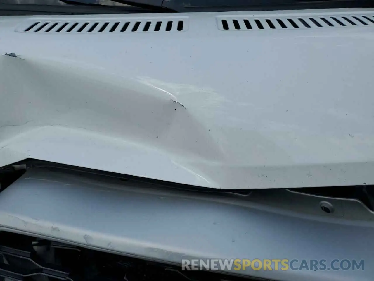 12 Photograph of a damaged car 3C6MRVJG2ME572613 RAM All Models 2021