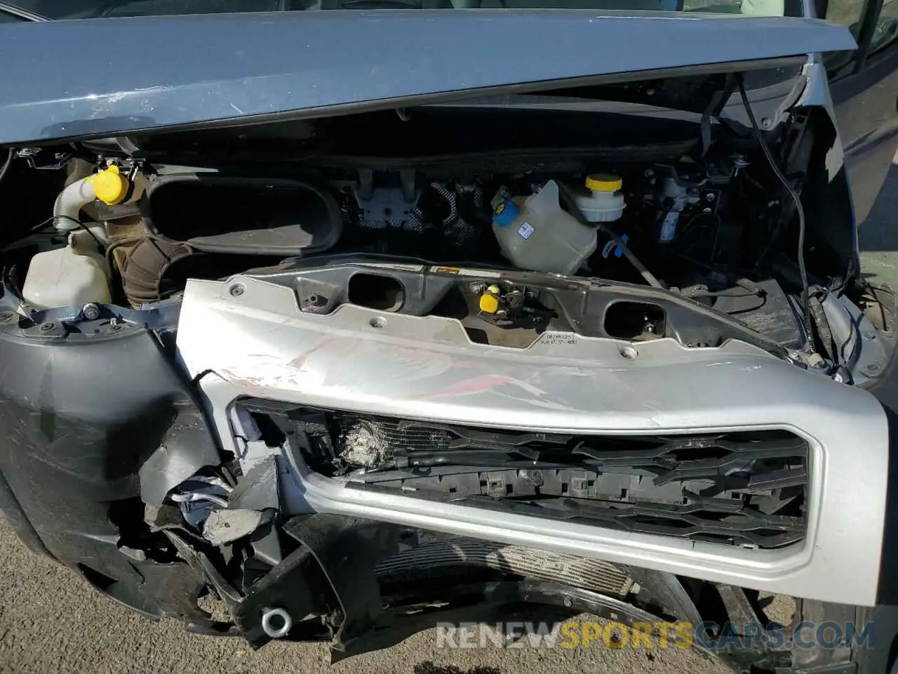 12 Photograph of a damaged car 3C6MRVJG7ME571568 RAM All Models 2021
