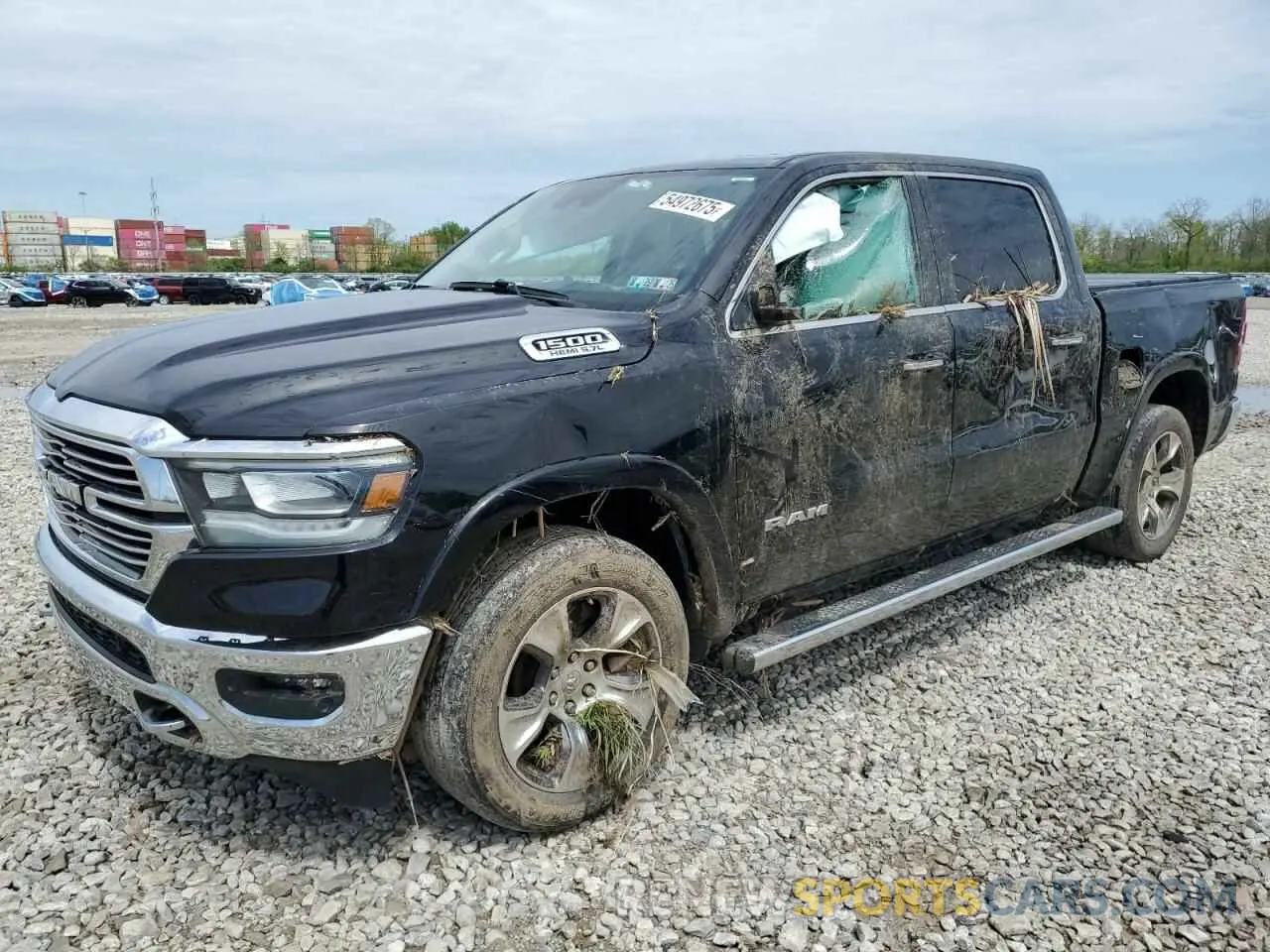 1 Photograph of a damaged car 1C6SRFJTXNN323578 RAM All Models 2022