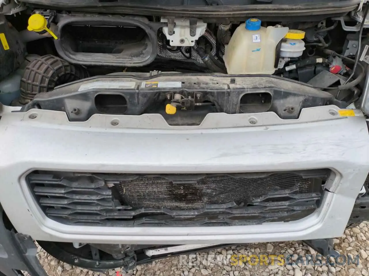 12 Photograph of a damaged car 3C6LRVCG2NE111339 RAM All Models 2022