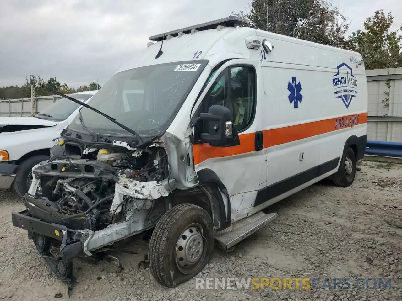 1 Photograph of a damaged car 3C6LRVDG9NE124961 RAM All Models 2022