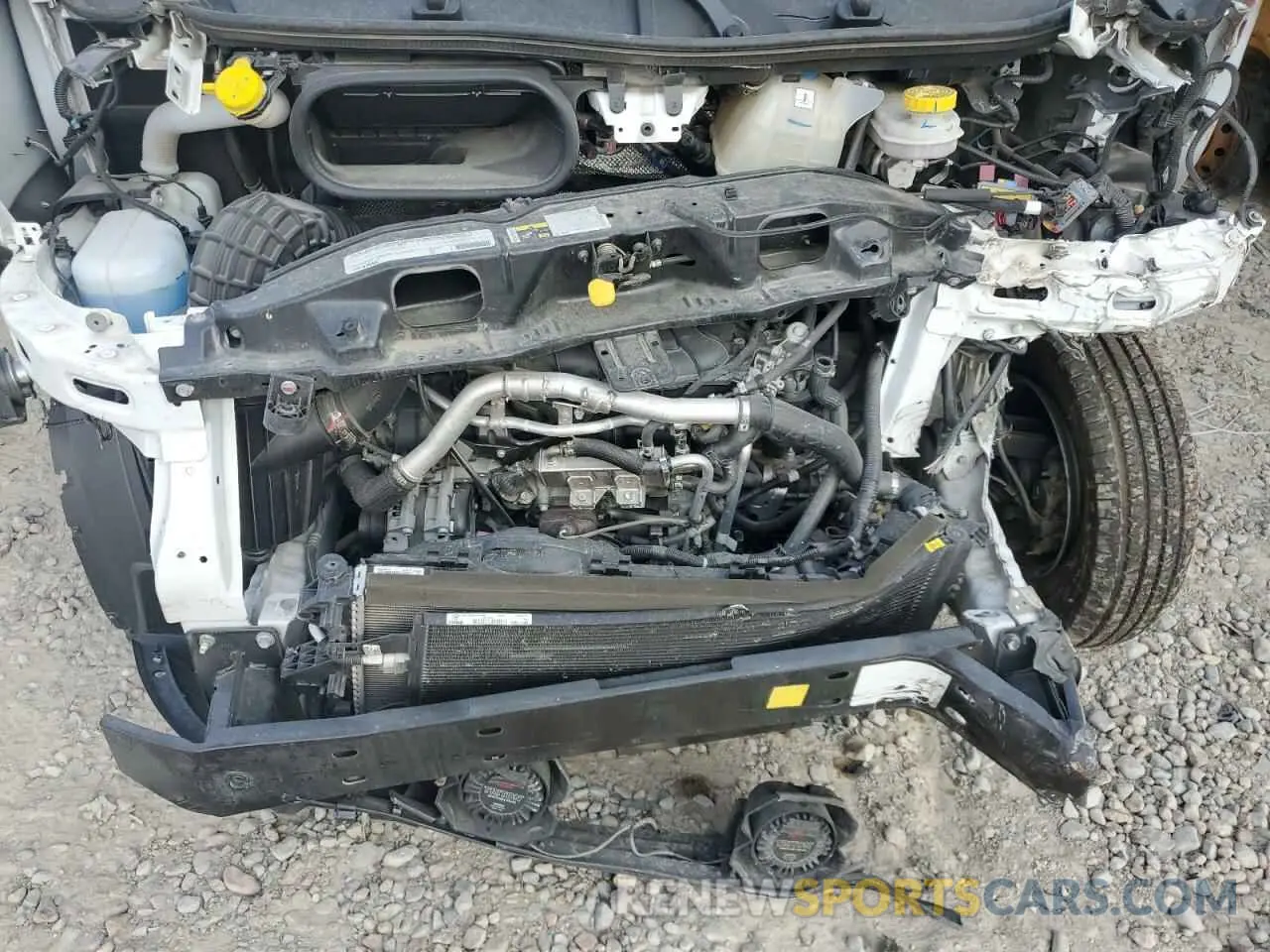 12 Photograph of a damaged car 3C6LRVDG9NE124961 RAM All Models 2022