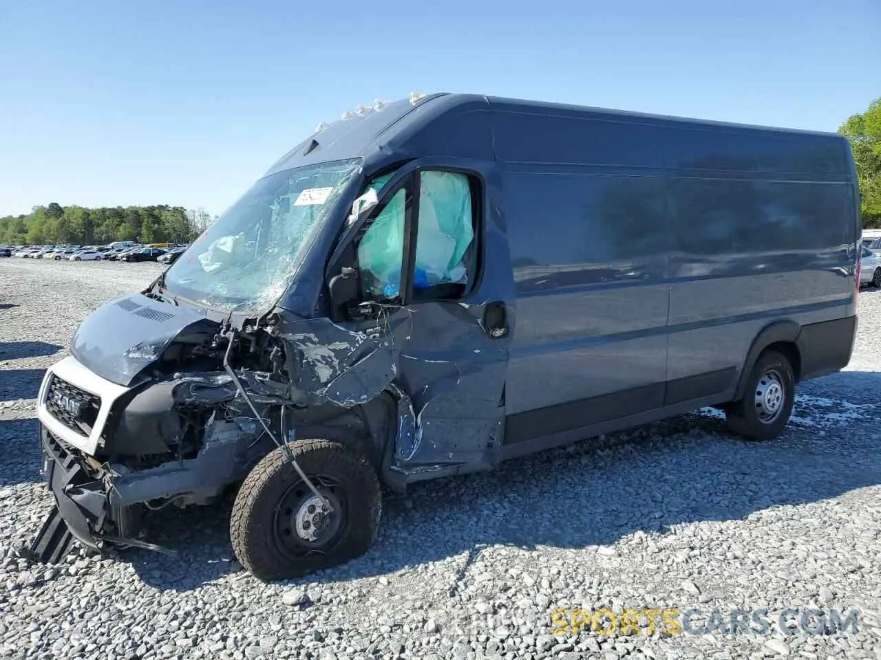 1 Photograph of a damaged car 3C6MRVJGXNE114254 RAM All Models 2022